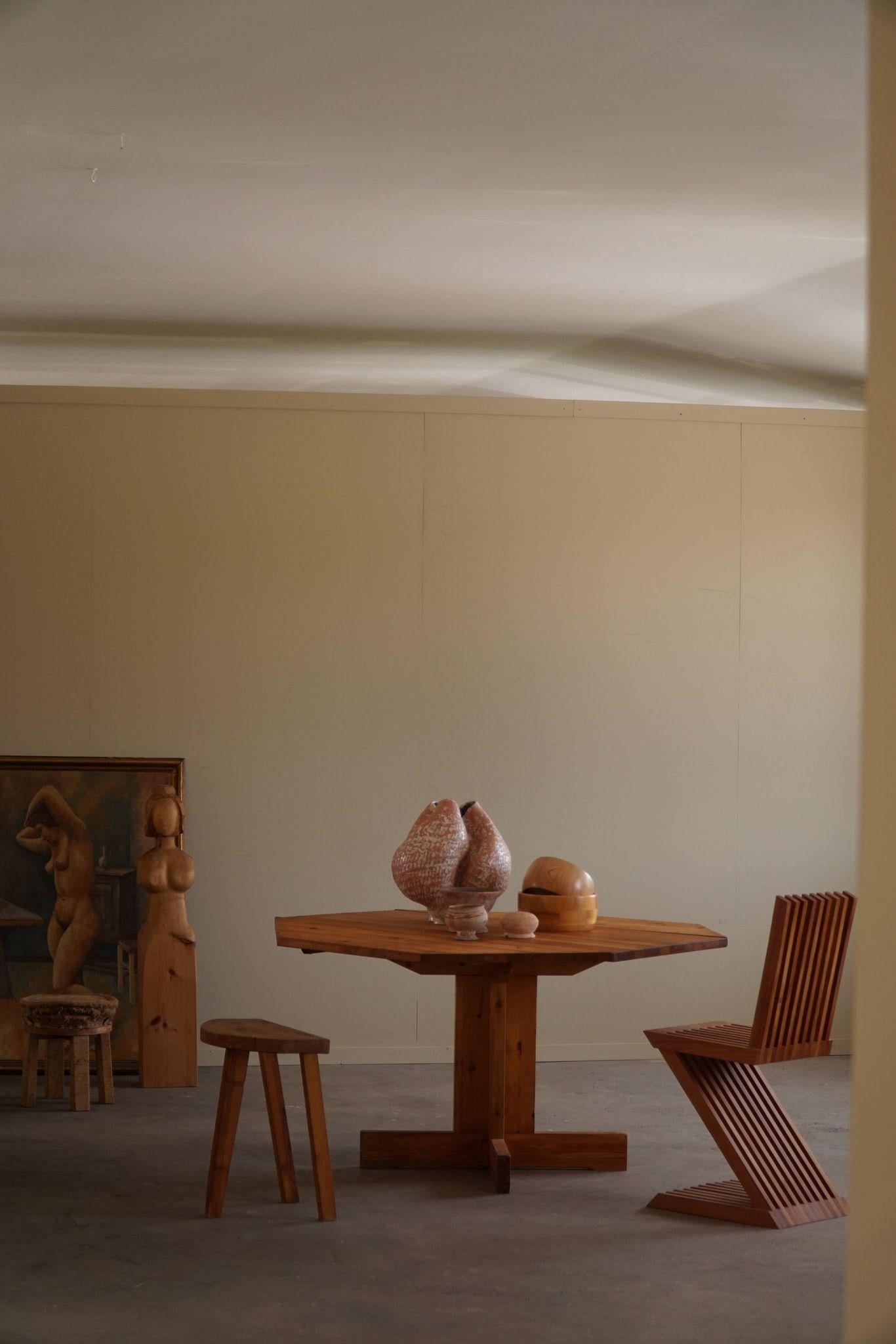 A charming mid century asymmetric Swedish folding / flip table in solid pine, made in the 1950s.
Handcrafted by unknown Swedish cabinetmaker. Nicely patinated. Great lines and wood grains that fits the modern interior. Traces of wear on the