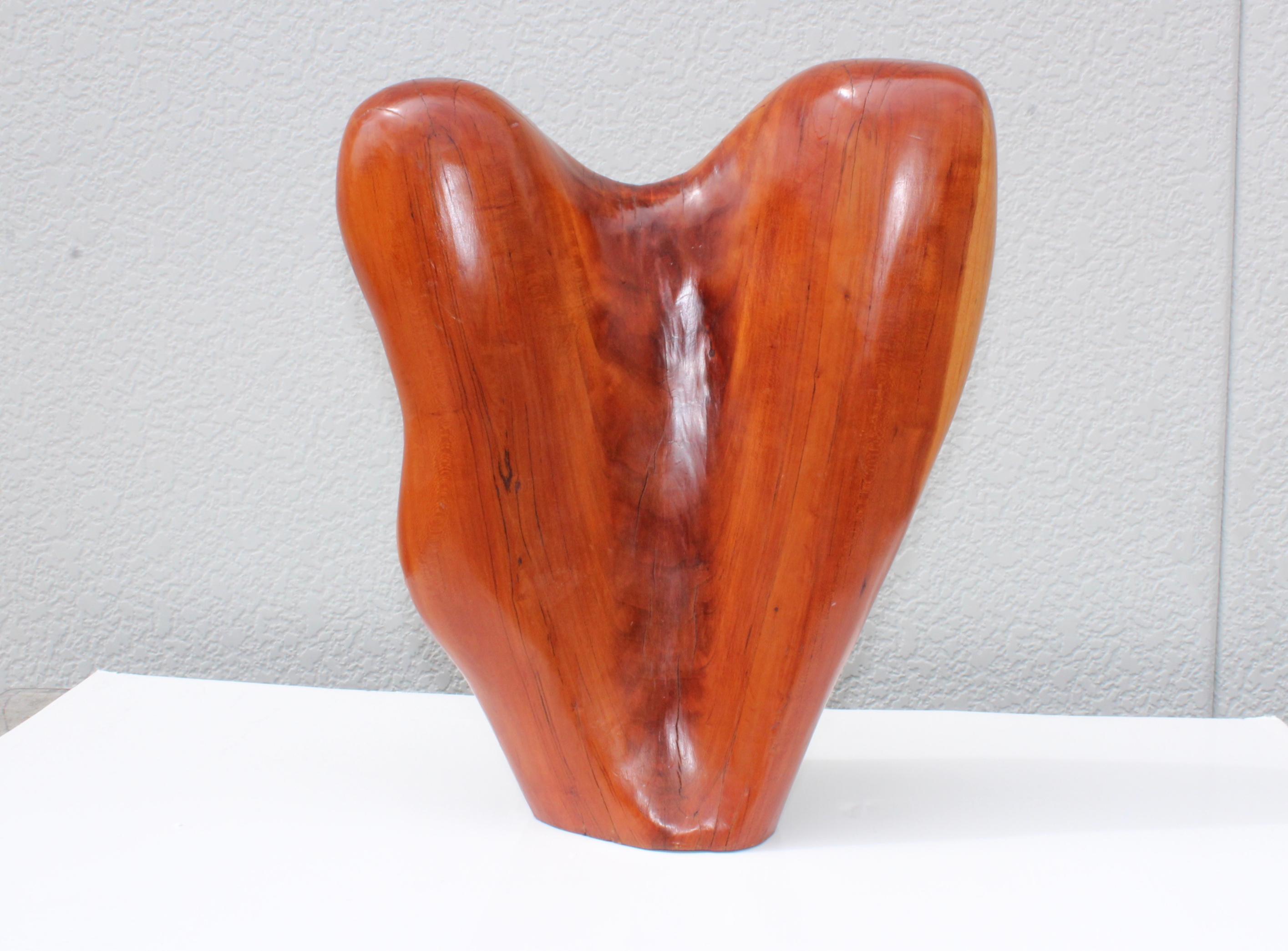 1980s carved wood abstract sculpture. Signed and dated.