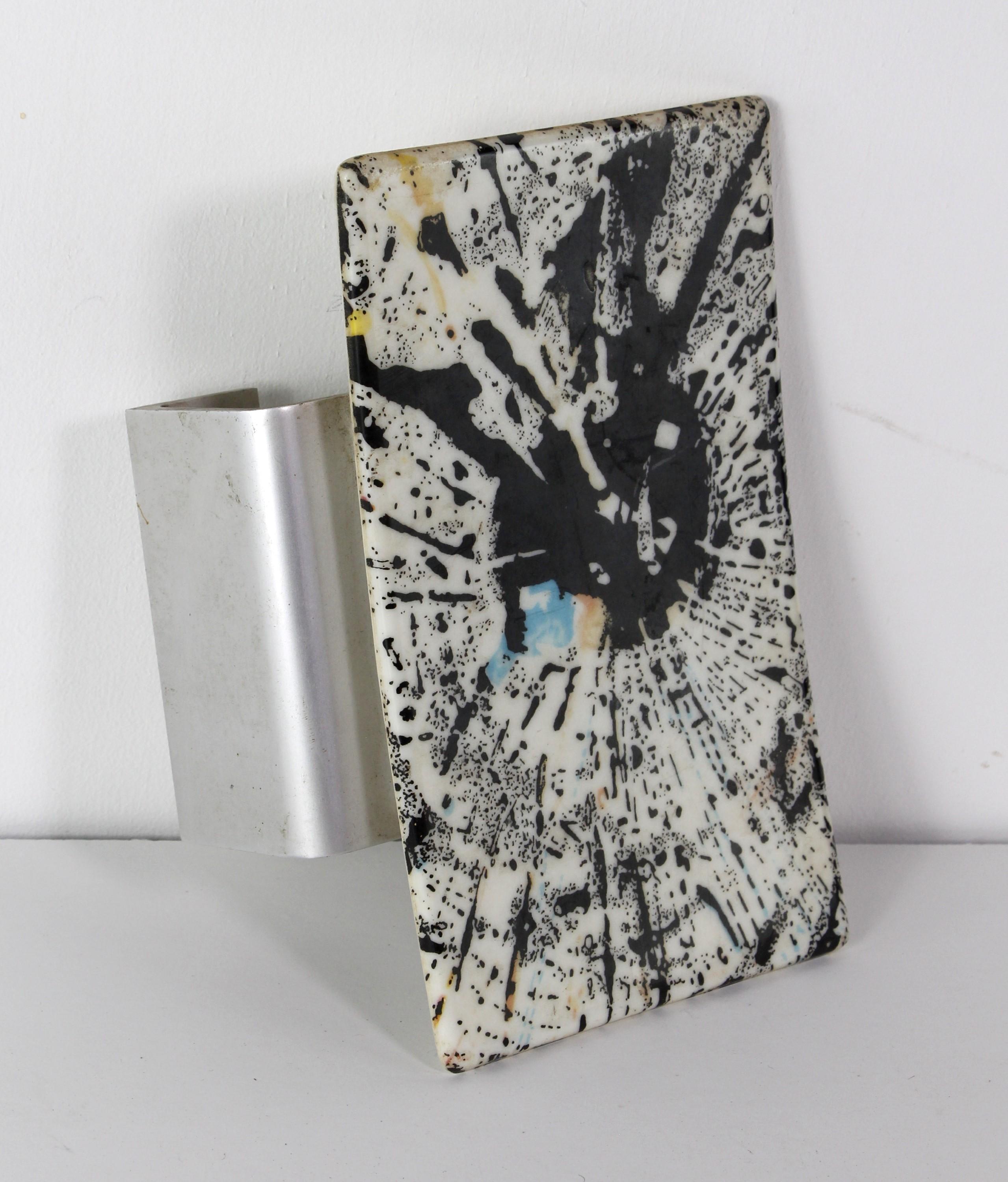 1960s Mid-Century Modern door pull made from aluminum and featuring a unique abstract black, white, blue, and orange Lucite design. The back is stamped Alma Mollet. Barcelona. Please note, this item is located in our Scranton, PA location.