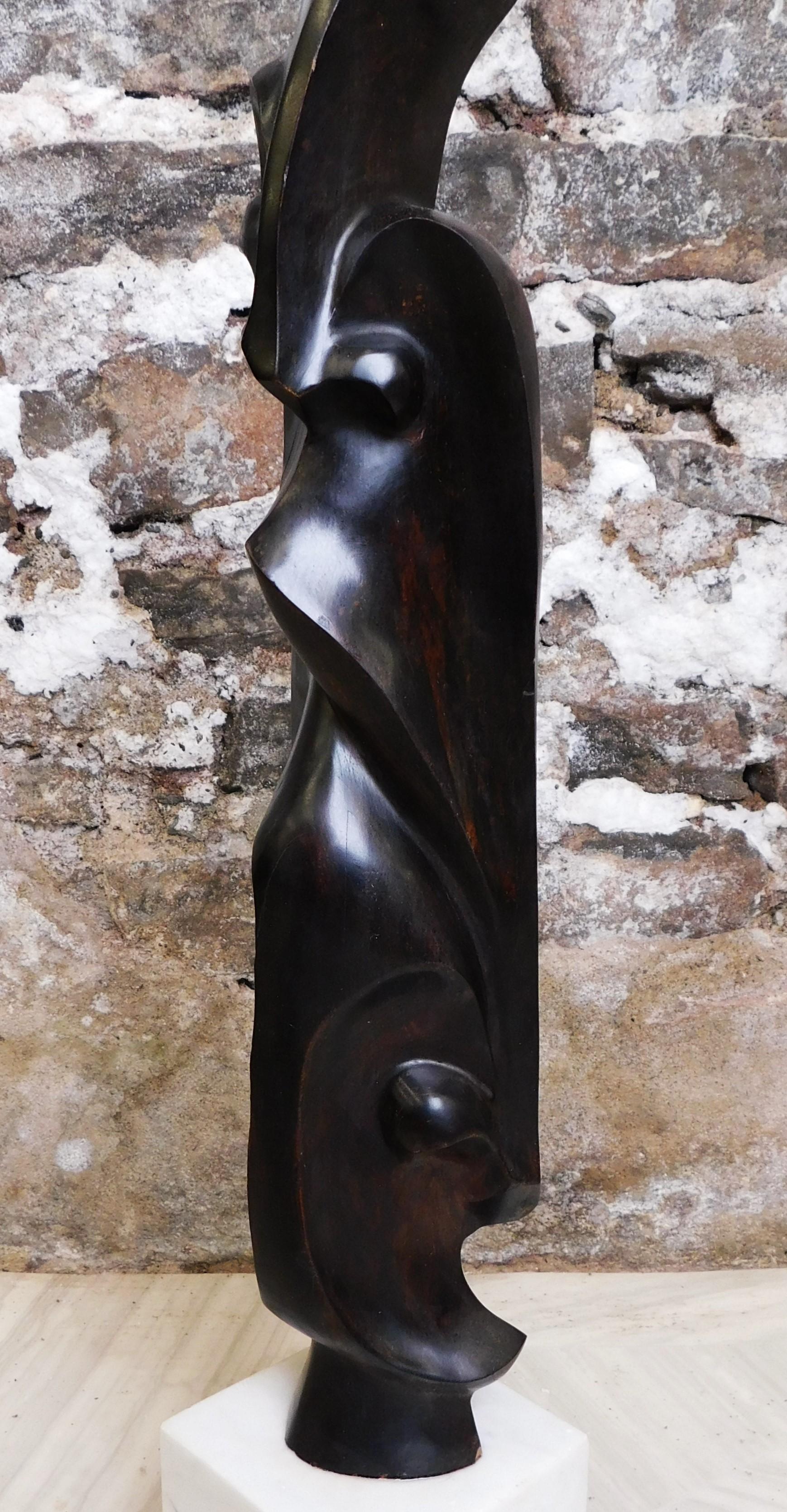 Hand-Carved Mid-Century Modern Abstract Ebony Wood Faces Sculpture with Marble Base For Sale