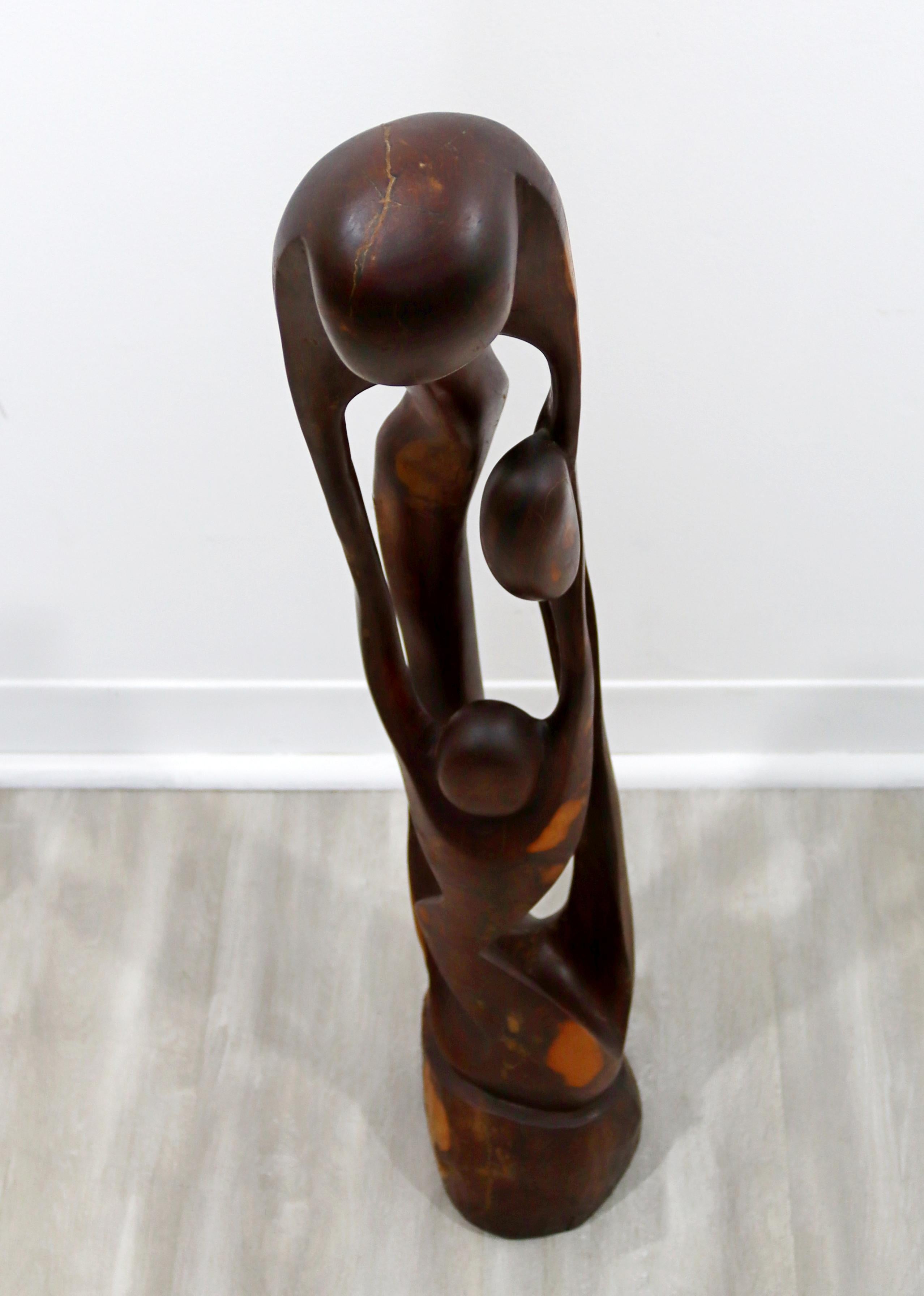 For your consideration is a beautiful, wood carved sculpture or statue of abstracted figures. In excellent vintage condition. The dimensions are 5
