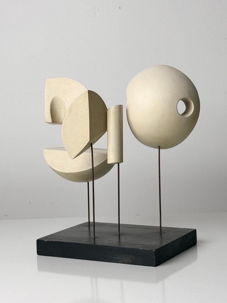 Outstanding Mid Century abstract geometric sculpture circa 1950s

Deconstructionist assemblage of hand painted wood elements in various shapes balanced on wire and mounted to black wooden base

Seemingly inspired by Barbara Hepworth
Unsigned

10