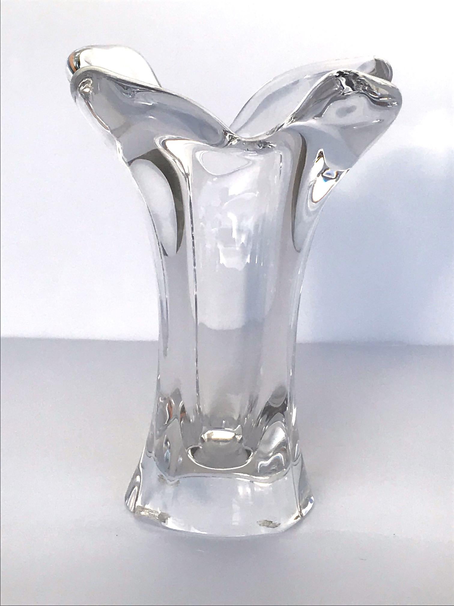 Elegant blown glass vase with abstract floral form. The vase has a slight twist formation creating the effect of movement and tapers down towards the base. Stunning from every angle and heavyset in weight. Signed Cofrac Art Verrier, France on the