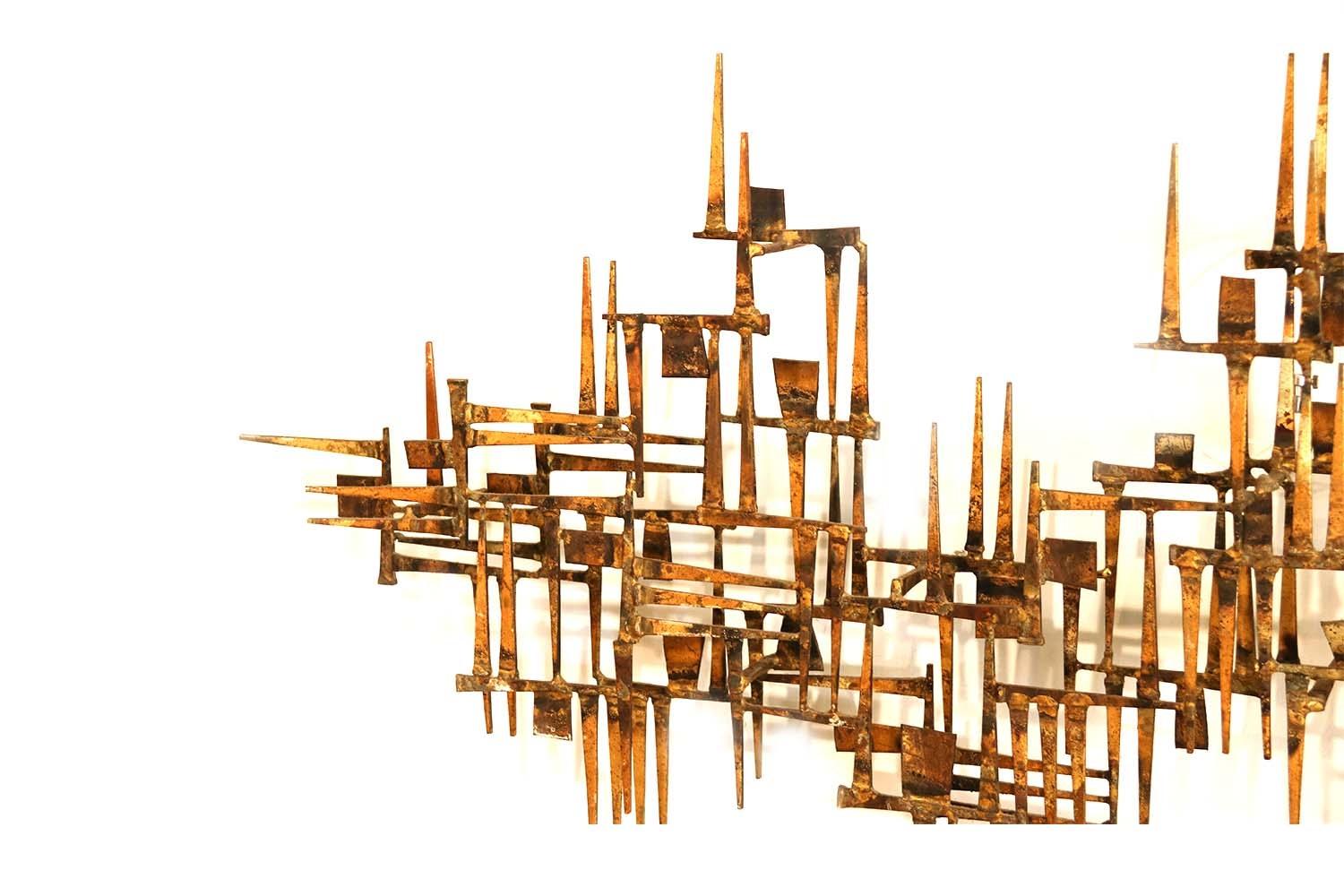 An impressive large wall nail sculpture in the style of William Bowie Harry Bertoia or C. Jere. Made to be mounted either horizontally or vertically, stands off the wall. Features amazing 3-dimensional hand welded and torch cut nail art with varying