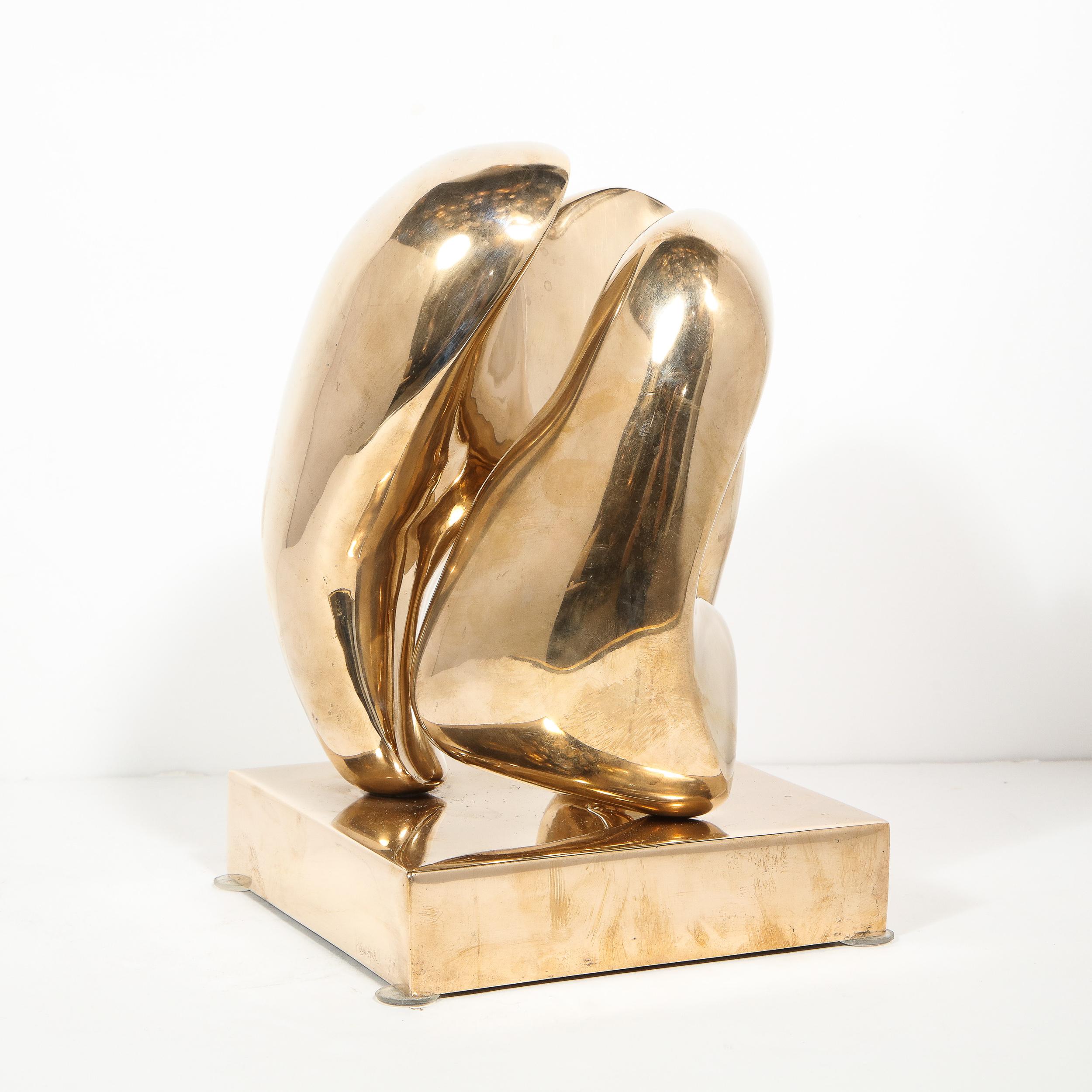This stunning Mid-Century Modern sculpture was realized by the esteemed maker Karpel in the United States, as part of a small edition of seven. Suggestive of sculptures by Henry Moore and Jean Arp, the sculpture offers two amorphic forms- suggestive