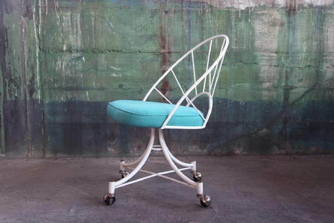 Gorgeous and incredibly unique rolling chair in the style of the Acapulco chair.
We have never seen these before, and we doubt we will again. A major conversation starter!

*One chair left

Very easy to reupholster these chairs to make them the