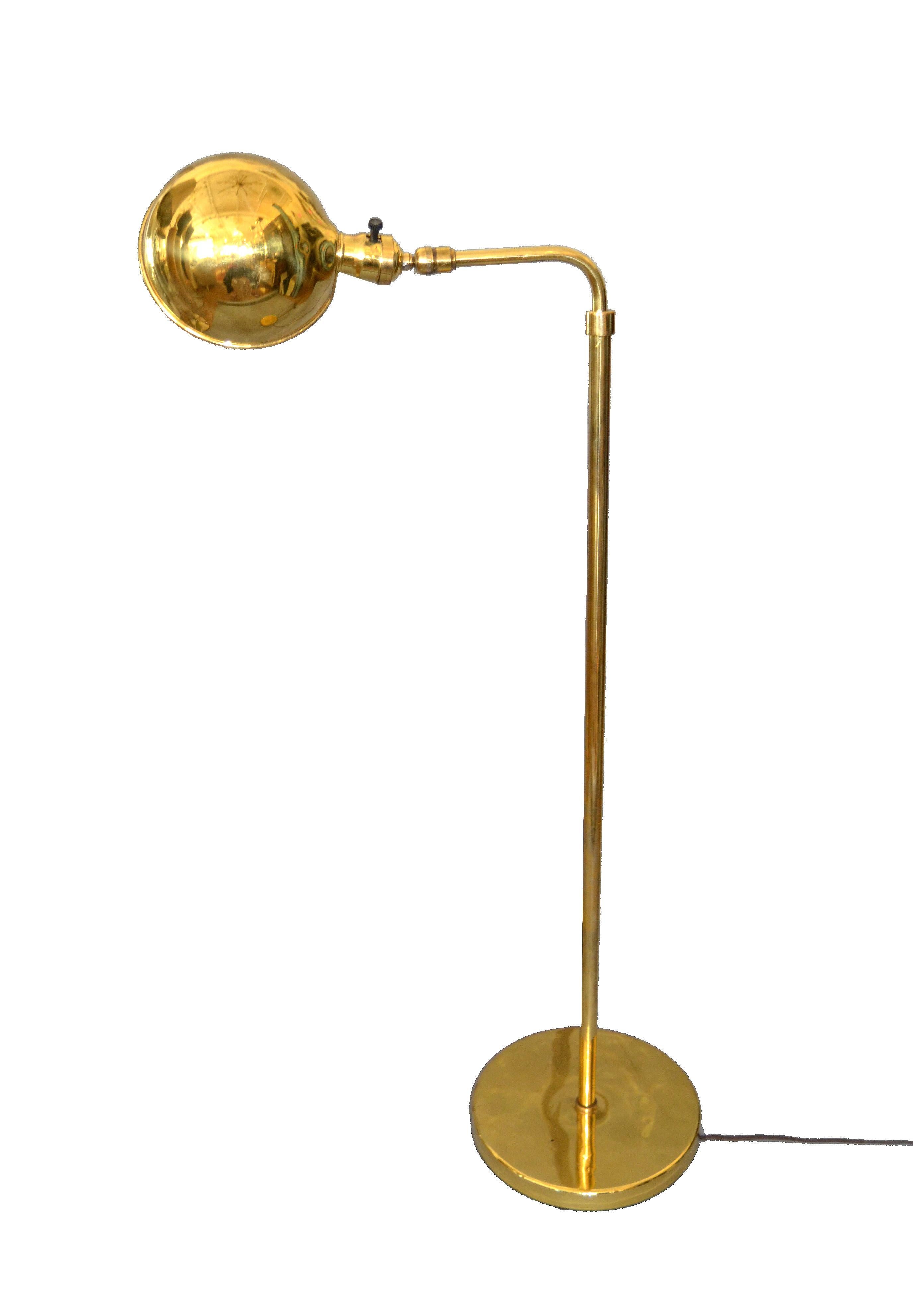 A Mid-Century Modern floor reading lamp with an angled arm and round shade that rotates.
In perfect working condition and uses a max. 60 watts light bulb.
This floor lamp height can be adjusted from 38.5 to 60 inches.