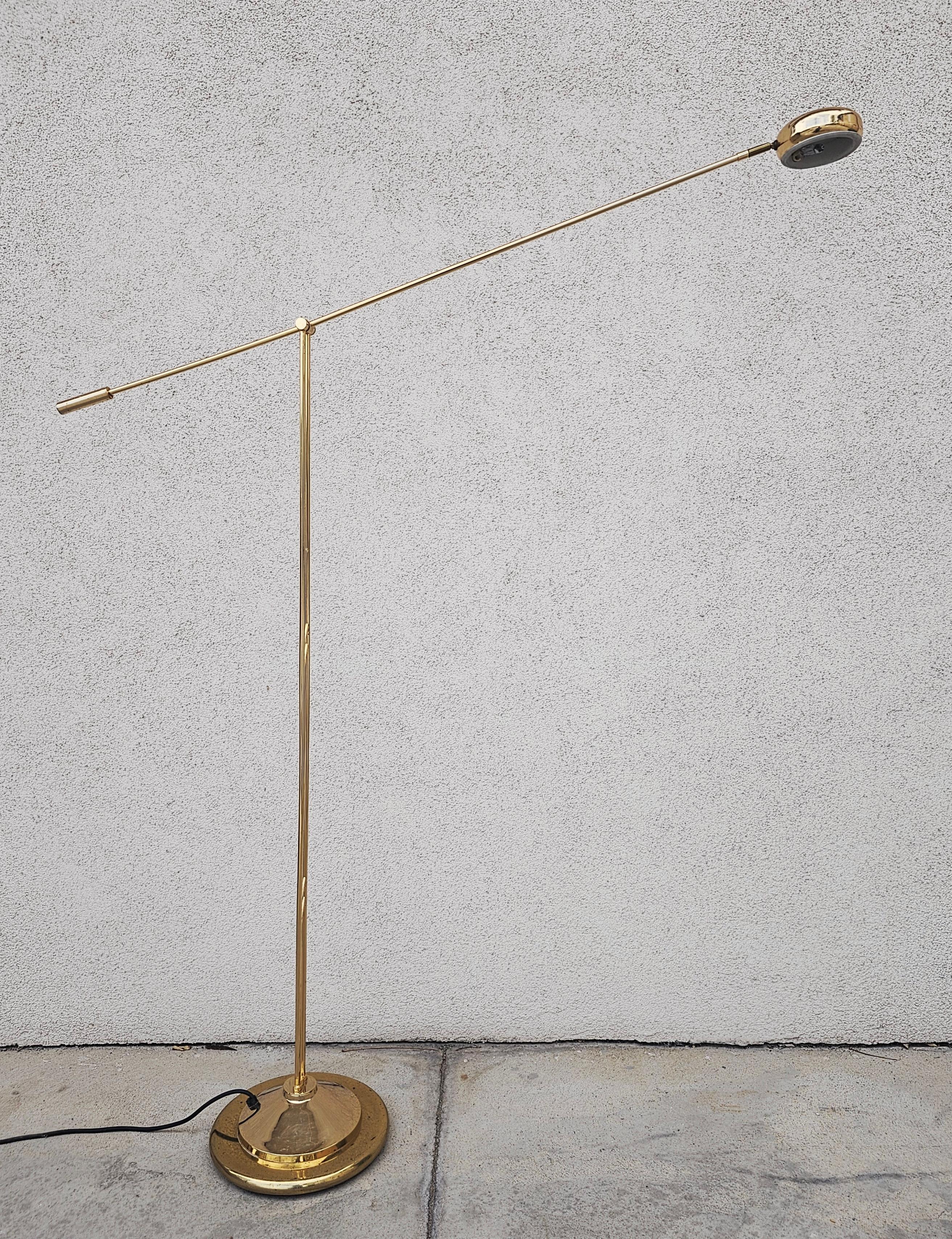 In this listing you will find an elegant and tall Mid Century Modern Floor Lamp. It's completely done in brass and features very elegant lines, with an adjustable arm that allows you play with the height of the light. The head of the lump is also