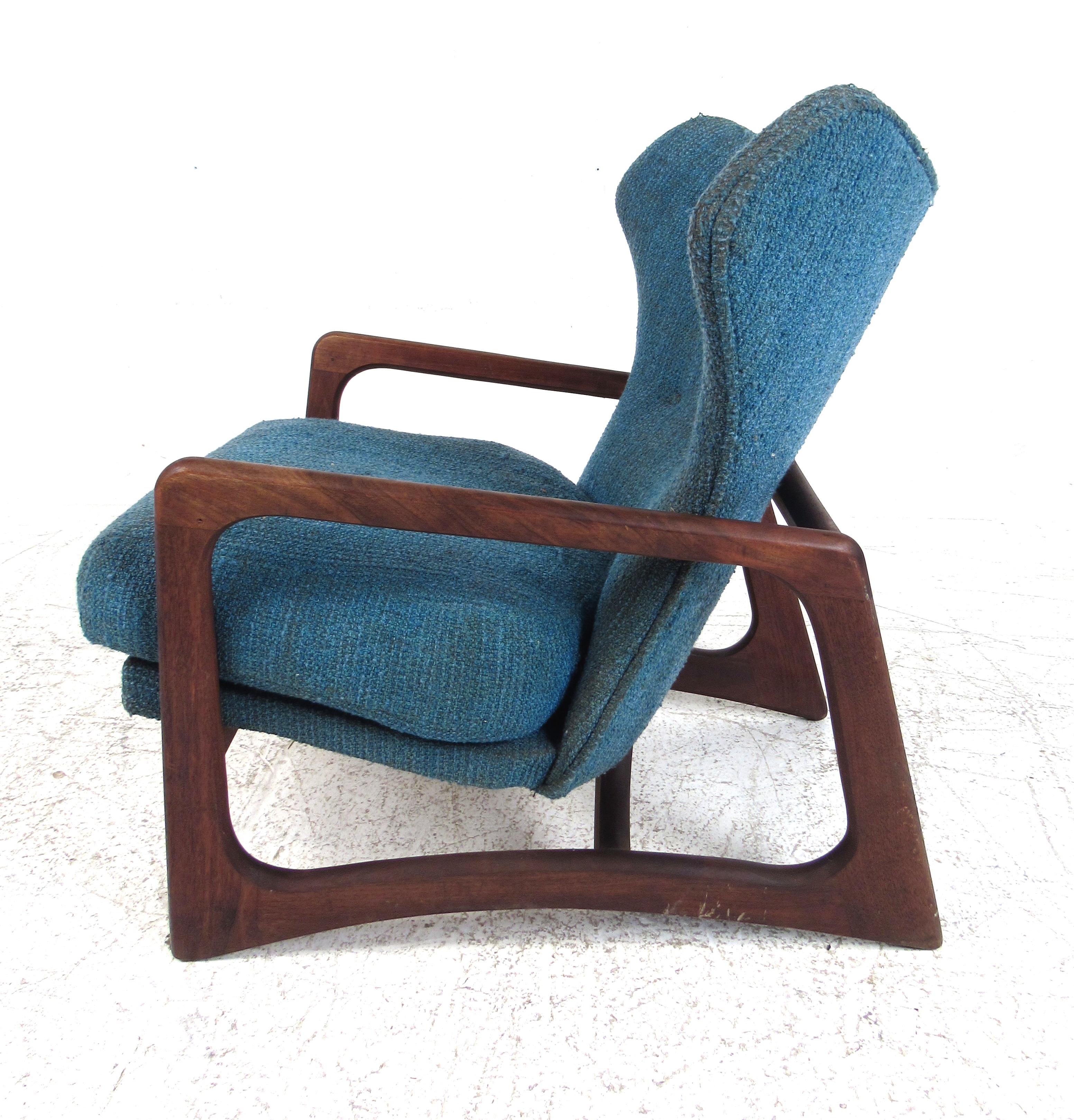 Adrian Pearsall for Craft Associates lounge chair # 2466-C featuring a solid walnut sculptured frame and a cushioned seat over a rubber strap base. Please confirm the item location (NY or NJ) with the dealer.
   
  