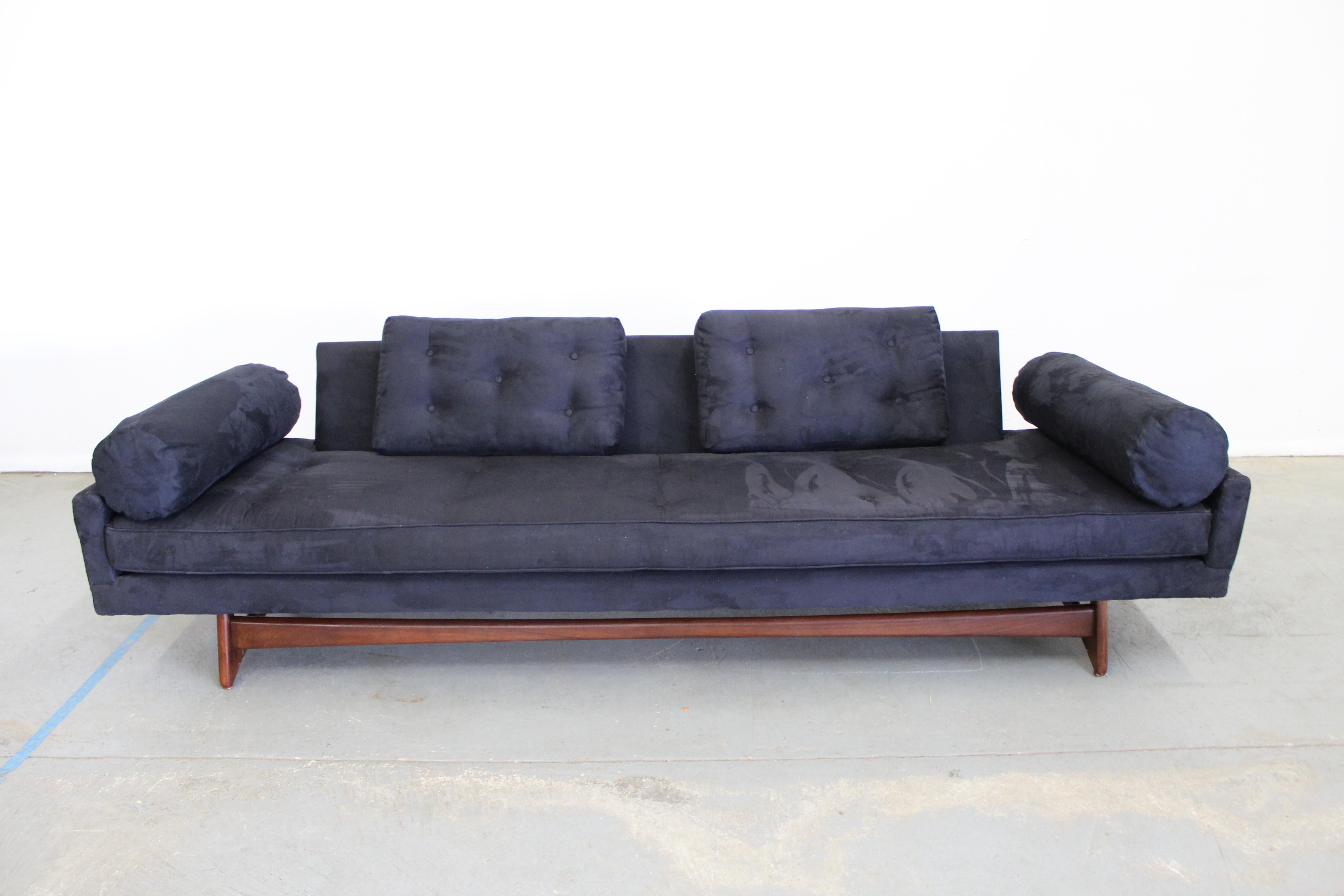 What a find. Offered is a beautiful Mid-Century Modern sofa (model 2408), designed by Adrian Pearsall for Craft Associates. Features beautifully sculpted wood legs with two back cushions and has been reupholstered by its previous owner with black