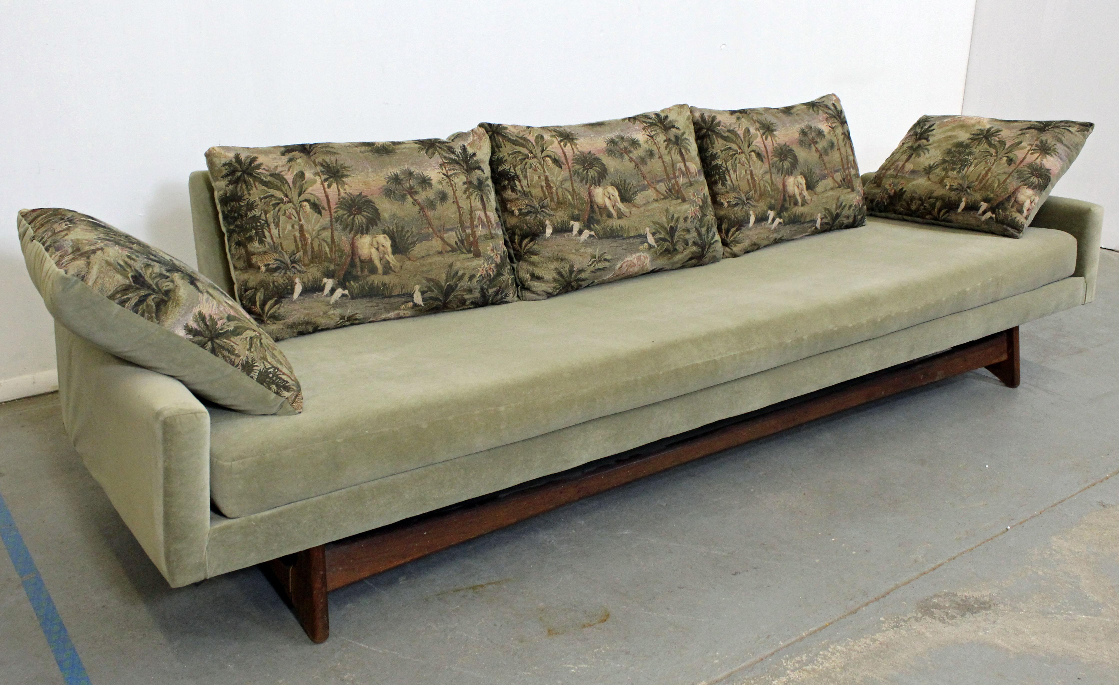 What a find. Offered is a beautiful Mid-Century Modern sofa with sculptural wood legs, designed by Adrian Pearsall for Craft Associates. It is in good condition, with some age wear (custom upholstery, previous repairs on legs; see pictures). Can be