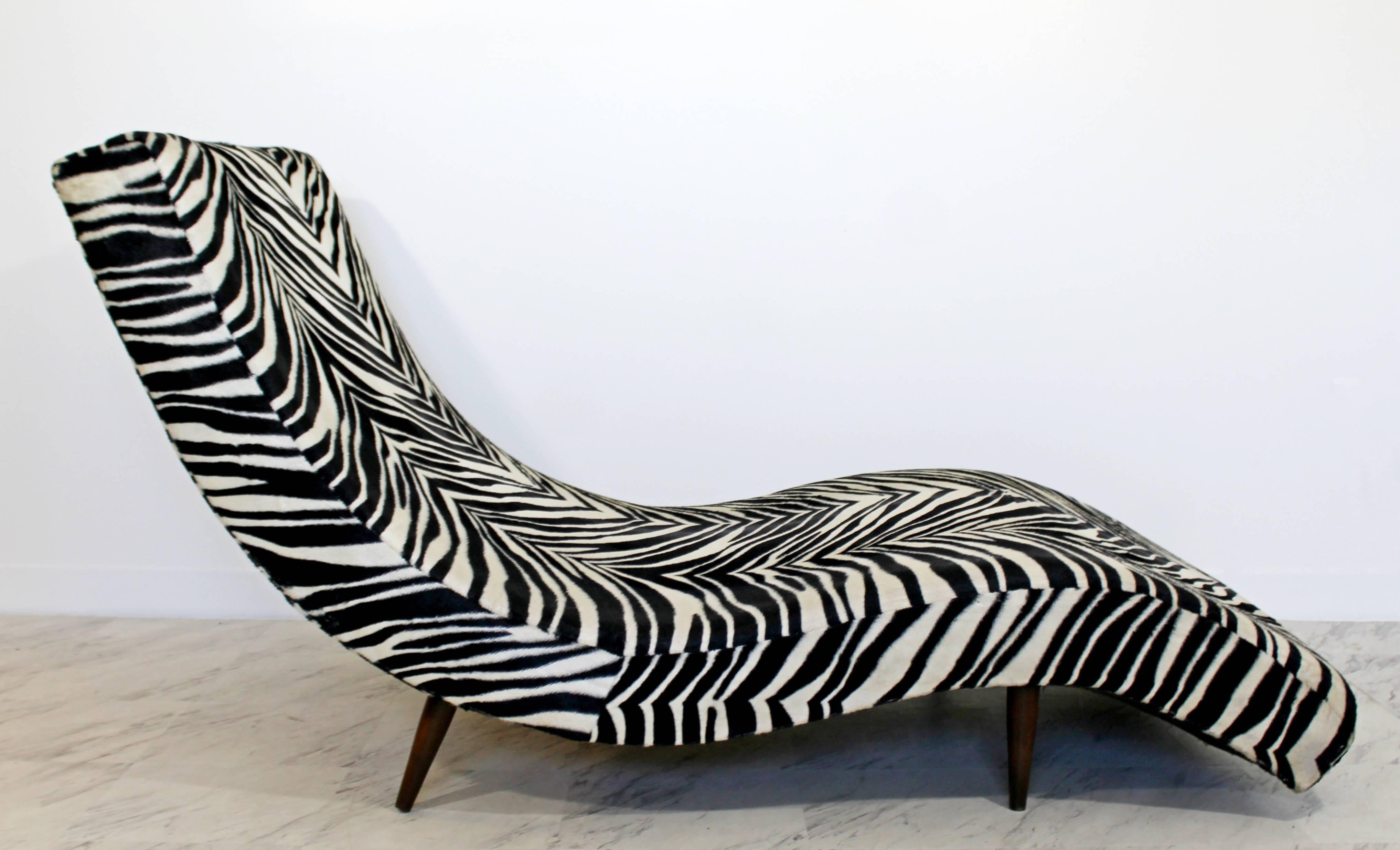 For your consideration is an incredible, zebra print, S or wave form chaise lounge, by Adrian Pearsall for Craft Associates, circa the 1960s. In excellent condition. The dimensions are 36