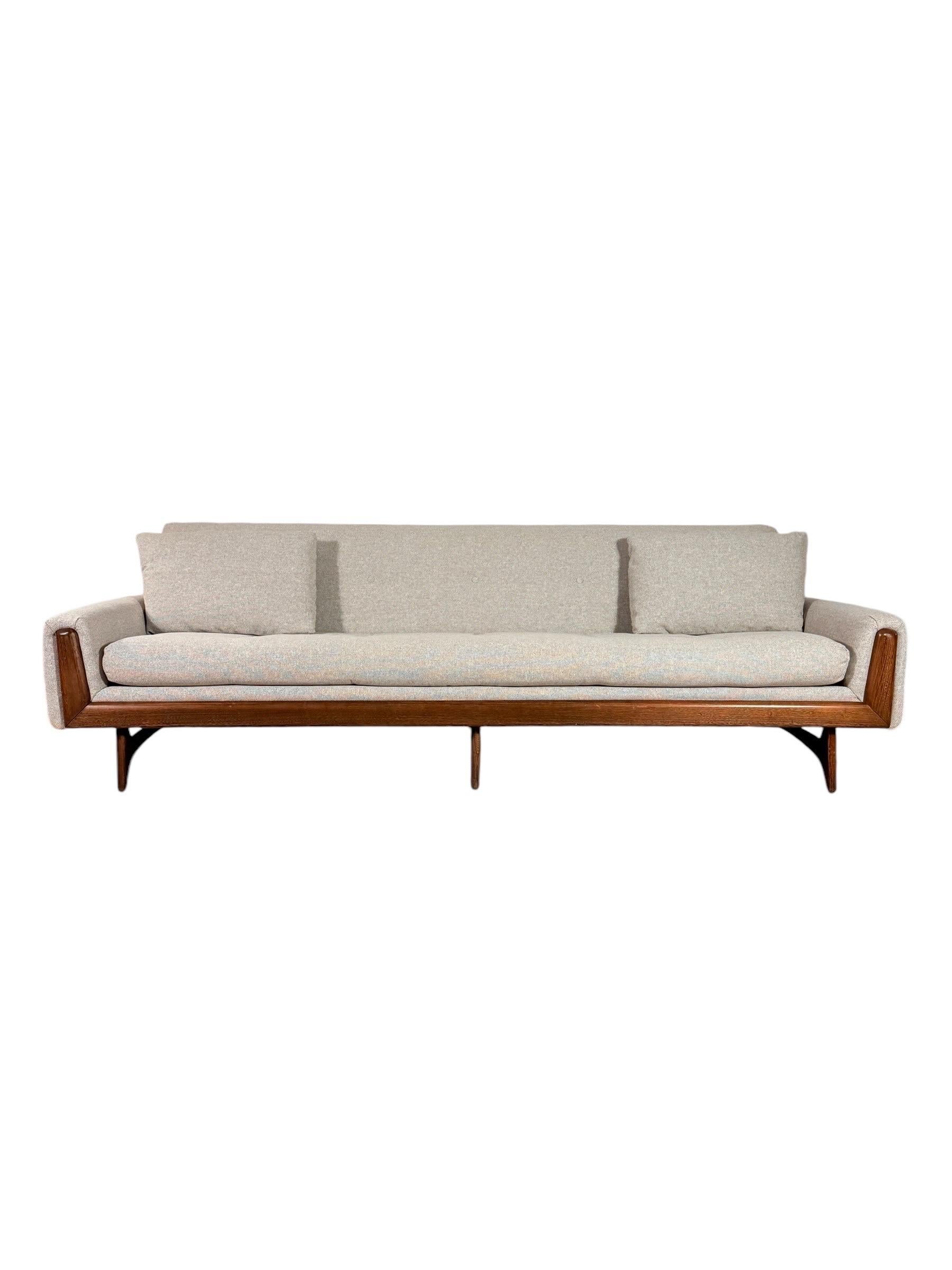 Experience the timeless elegance of this fully restored mid-century modern sofa, inspired by Adrian Pearsall’s iconic designs and crafted by Rowe Furniture. Measuring an impressive 93” wide, 32” deep, and 29” tall (17.5” to the seat), this piece