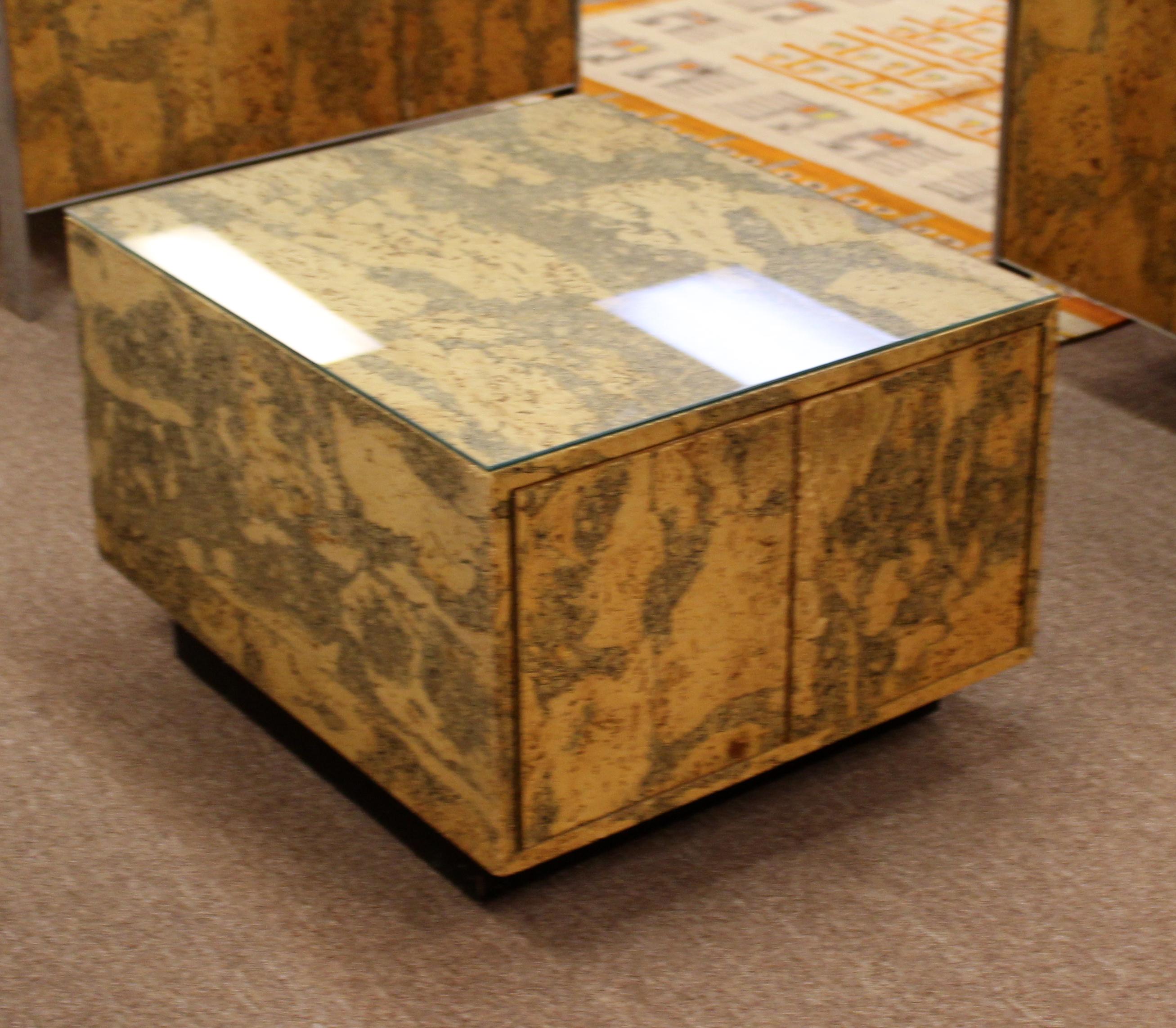 For your consideration is a fantastic end table, made of cork and with a glass top and doors that open to storage space, by Adrian Pearsall, circa 1970s. In very good vintage condition. The dimensions are 24