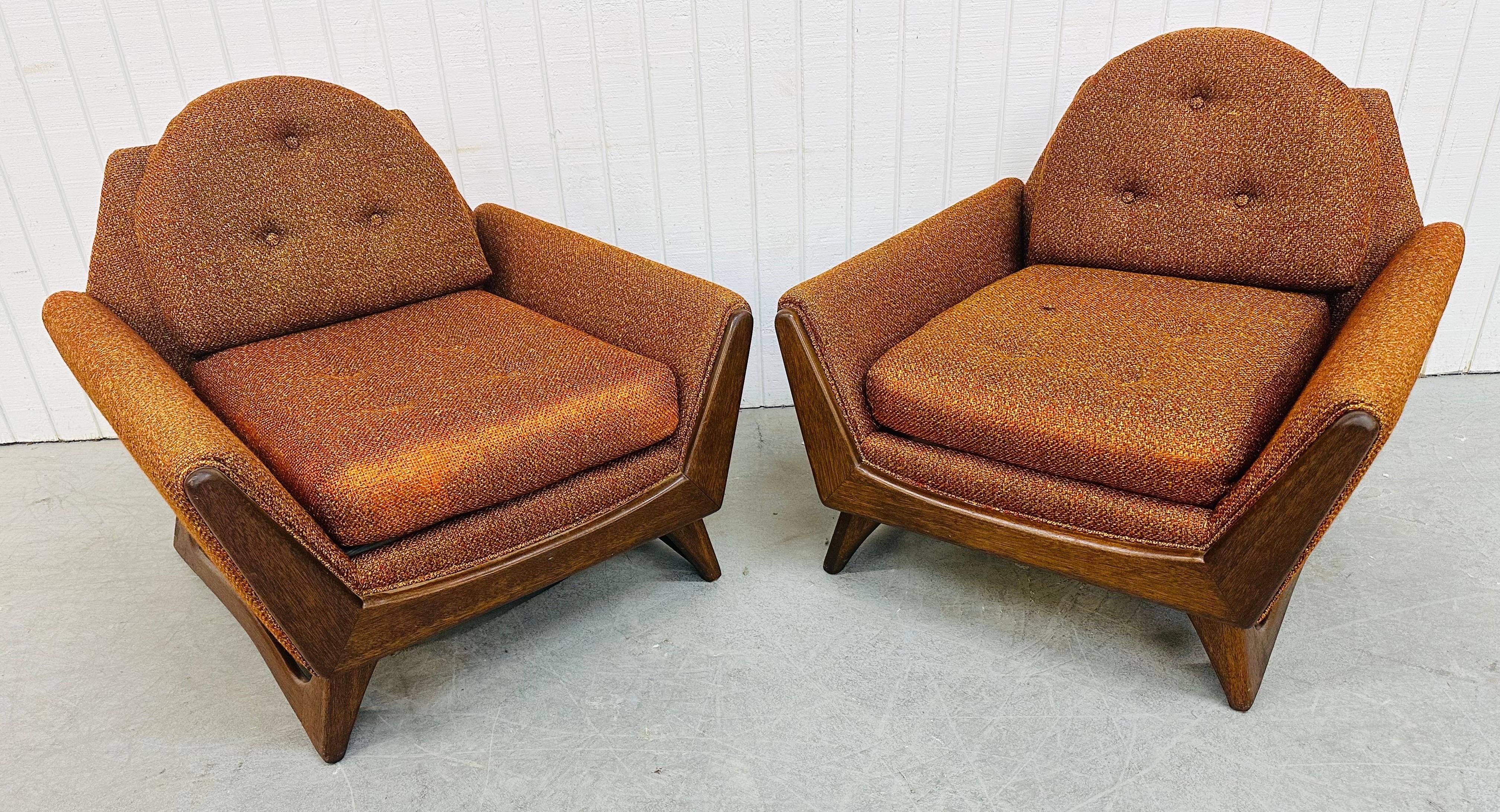 This listing is for a pair of Mid-Century Modern Adrian Pearsall Style Burnt Orange Walnut Arm Chairs. Featuring an Adrian Pearsall style design, original burnt orange upholstery, removal cushions, and angular walnut legs. This is an exceptional