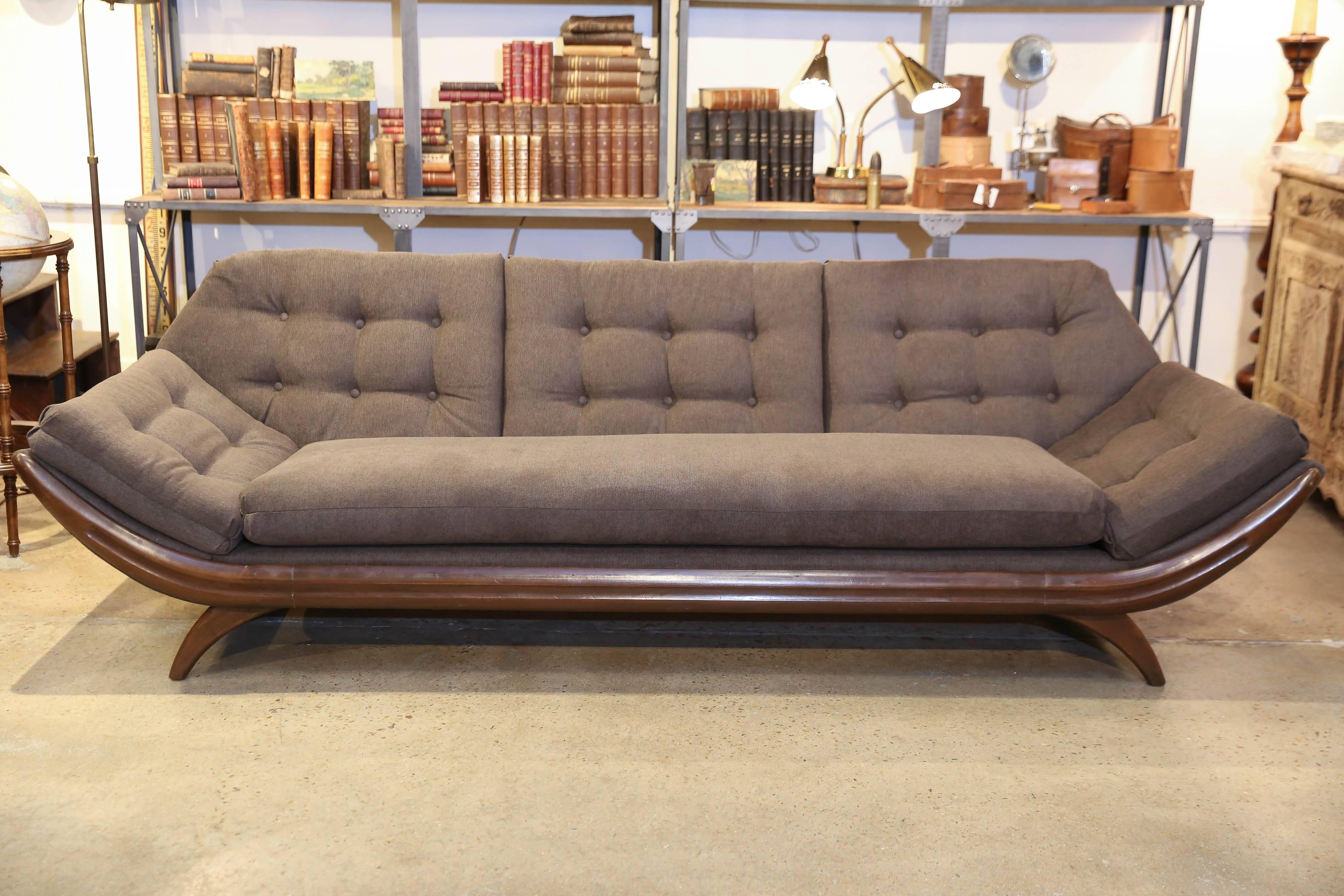 Reconstructed and Reupholstered Mid-Century Modern Adrian Pearsall style wide gondola sofa constructed with wood base and wooden legs. Reupholstered in a charcoal grey fabric, removable seat and back cushions for comfort. 

Matching chair listed.