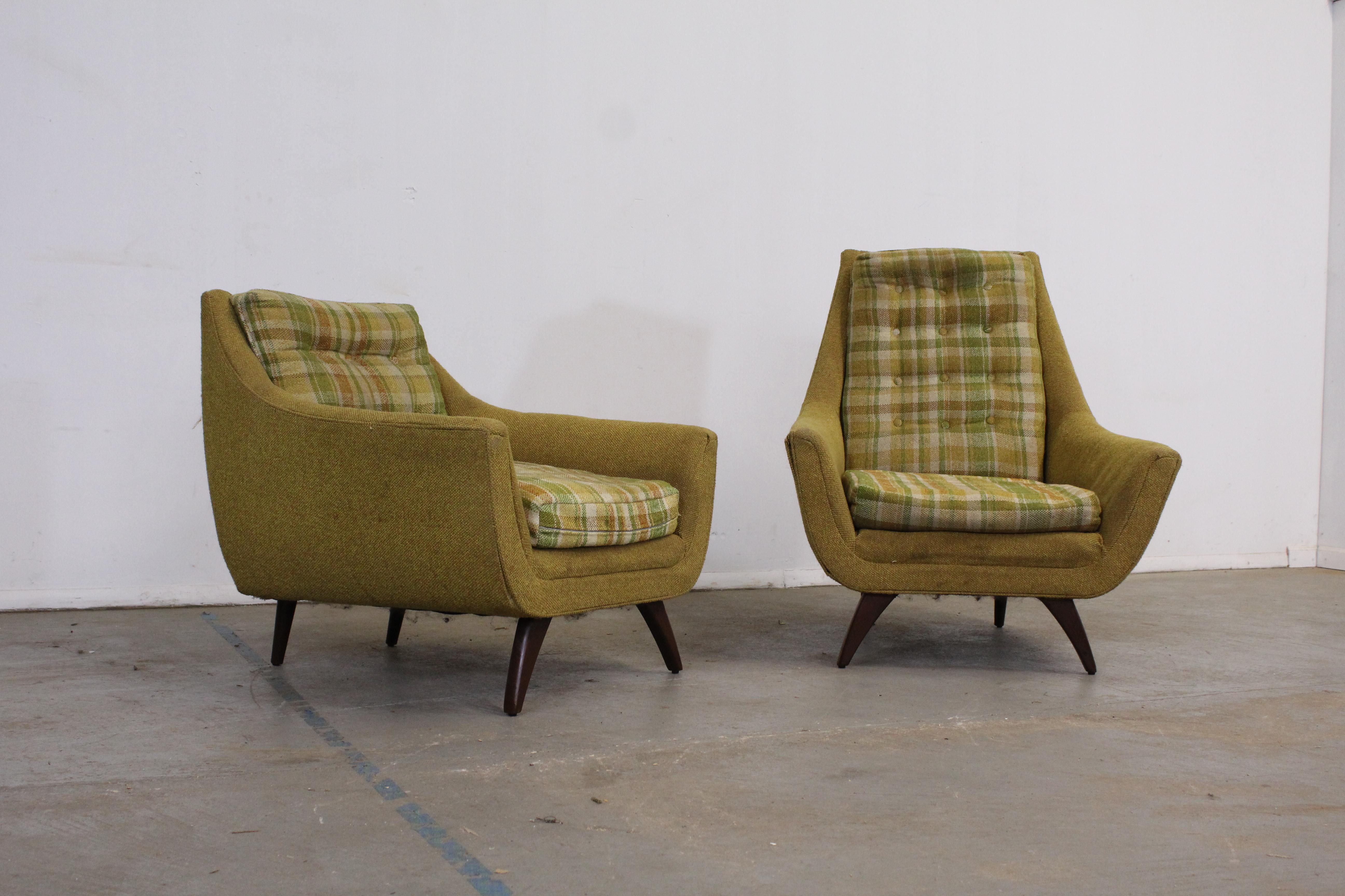 Offered is a pair of gorgeous His/Hers Mid-Century Modern lounge chairs similar to the style of Adrian Pearsall. Absolutely incredible lines on these chairs. The chairs are in need of restoration(cushions and upholstery). They are in good structural