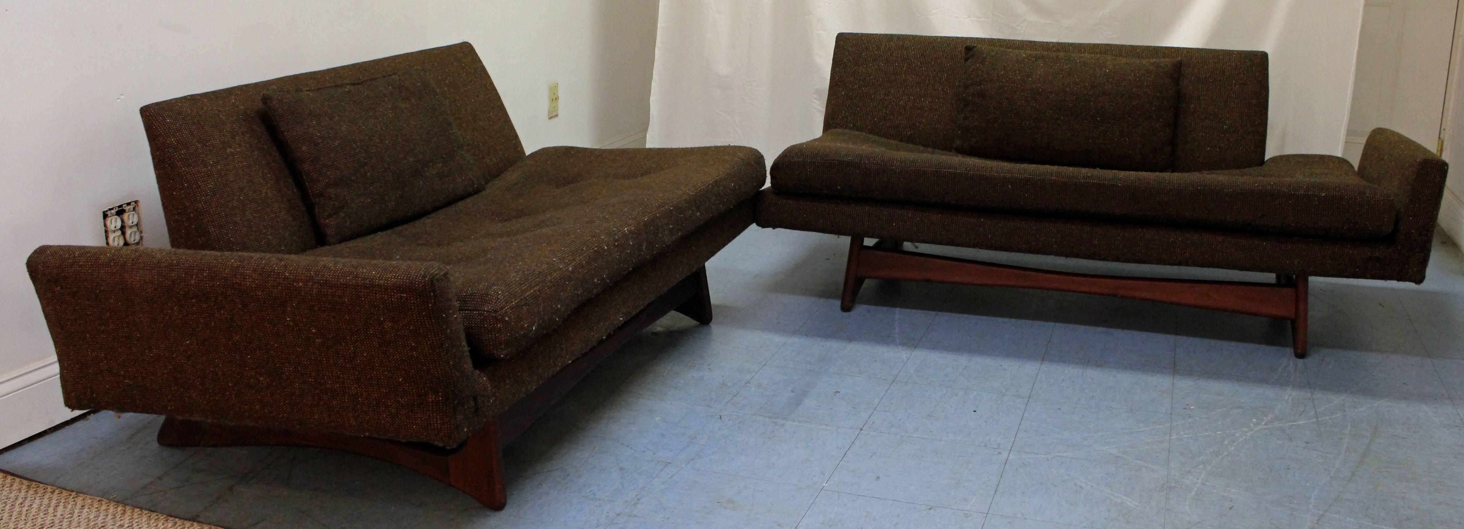 This is an original, rare sectional sofa by Adrian Pearsall. Features a walnut sculpted base. Base is in good condition, but needs reupholstering.

Seat height: 16.5