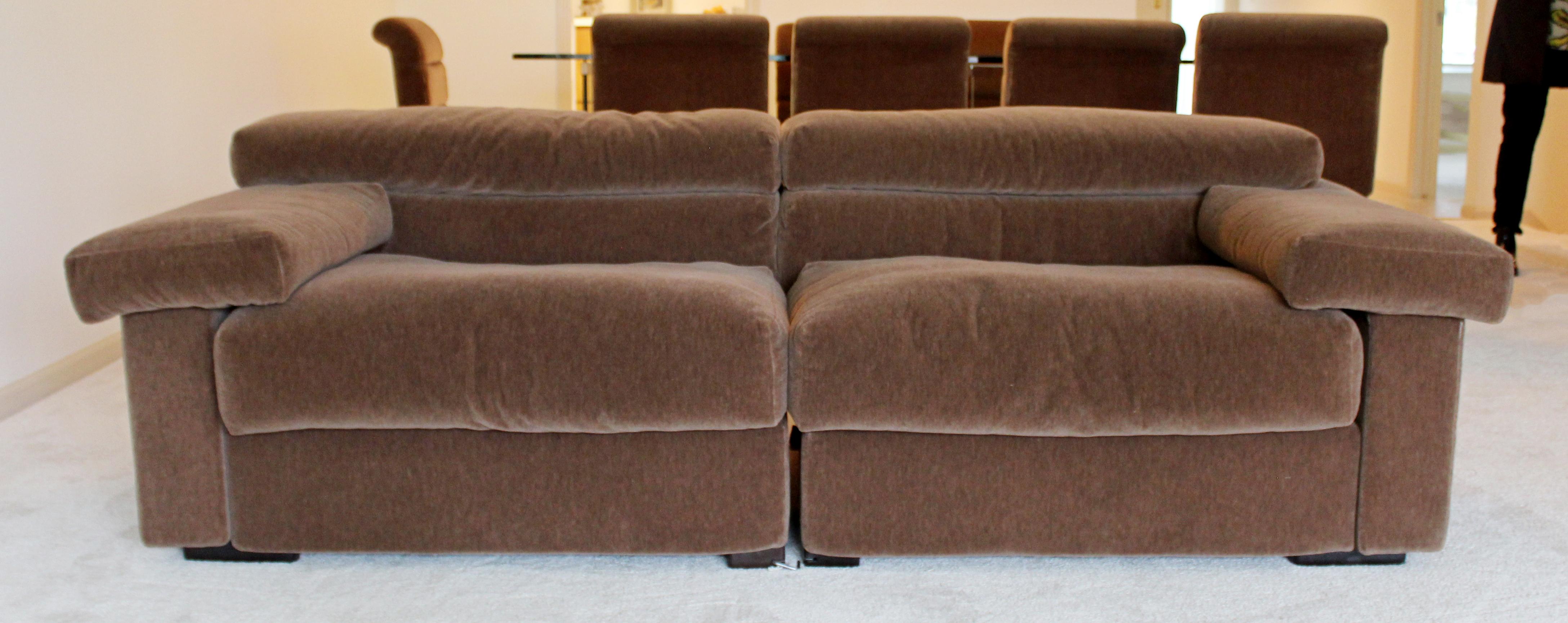 For your consideration is a remarkable pair of sectional sofas, with lush brown velvet upholstery, by Afra and Tobia Scarpa for B&B Italia, called The Erasmo collection, circa the 1970s. In excellent vintage condition. The dimensions of each of the