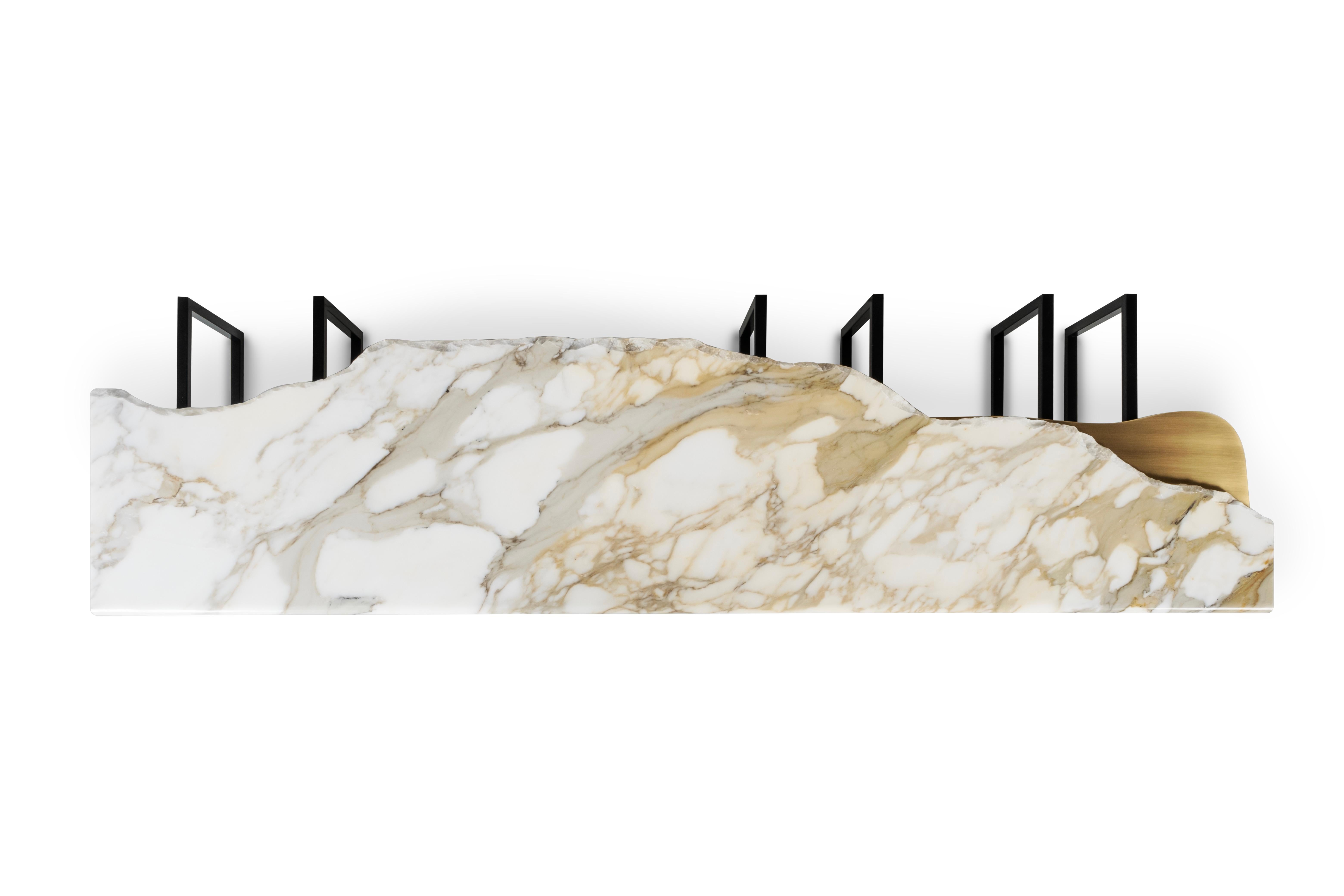 Tavolino da caffè Aire, collezione Contemporary, realizzato a mano in Portogallo - Europa di Greenapple.

Il tavolino in marmo Aire è un'espressione audace di moderna raffinatezza. Ispirato alle affascinanti Grutas de Mira de Aire, il suo design