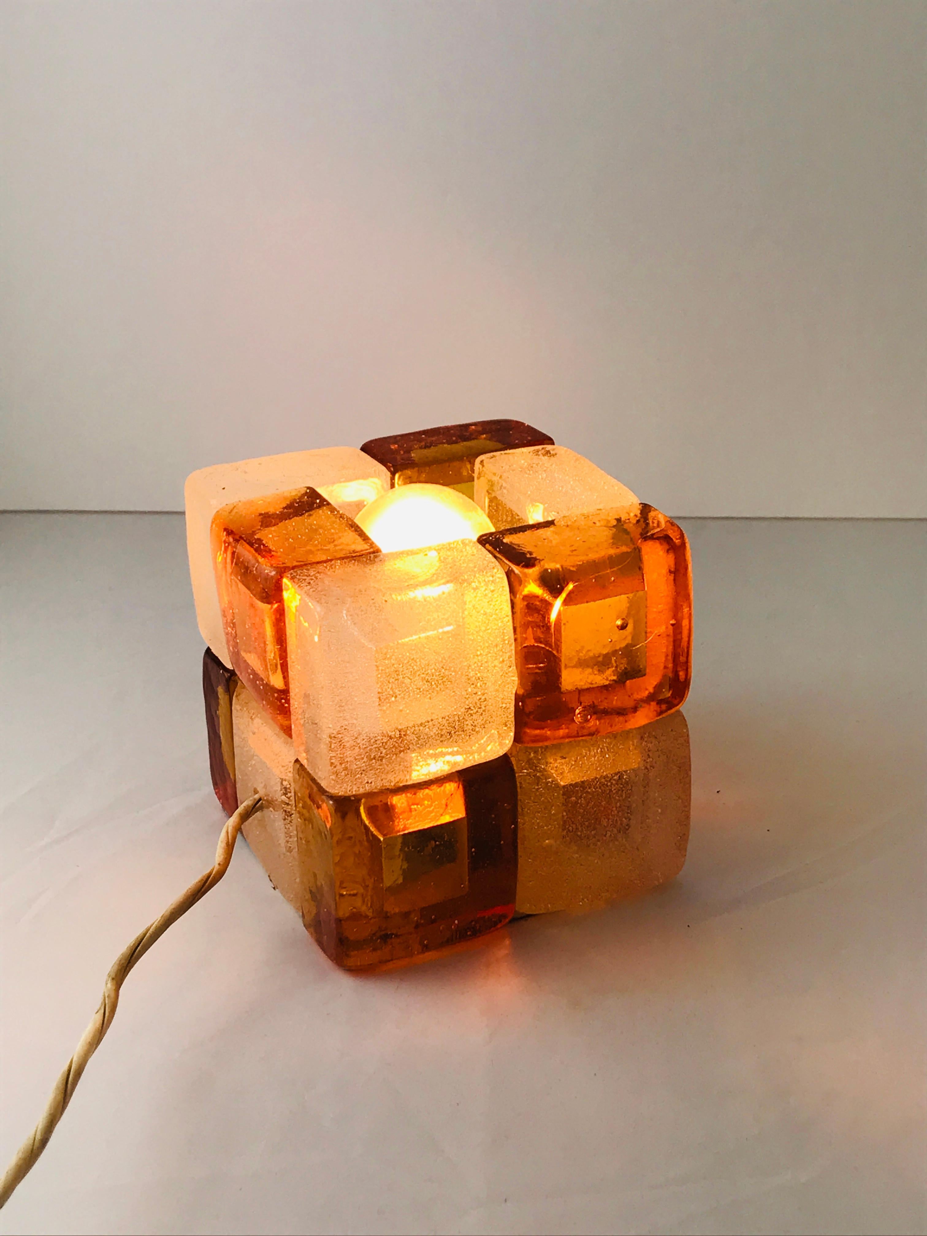 Albano Poli cube lamp in orange and white Murano glass, 1960s, Italy.
Good condition beautiful on a bed side table.
 