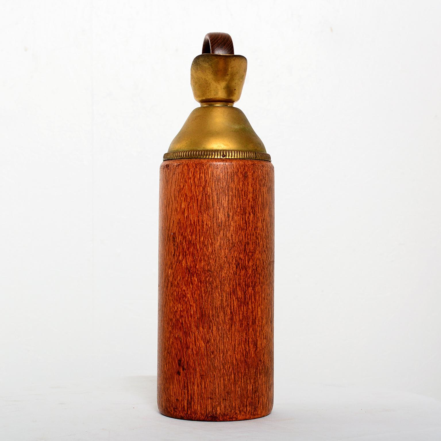 Pitcher
Italian Vintage pitcher thermos by Aldo Tura. Brass and teakwood.  
Unmarked.
Italy circa the 1950s.
Dimensions: 6