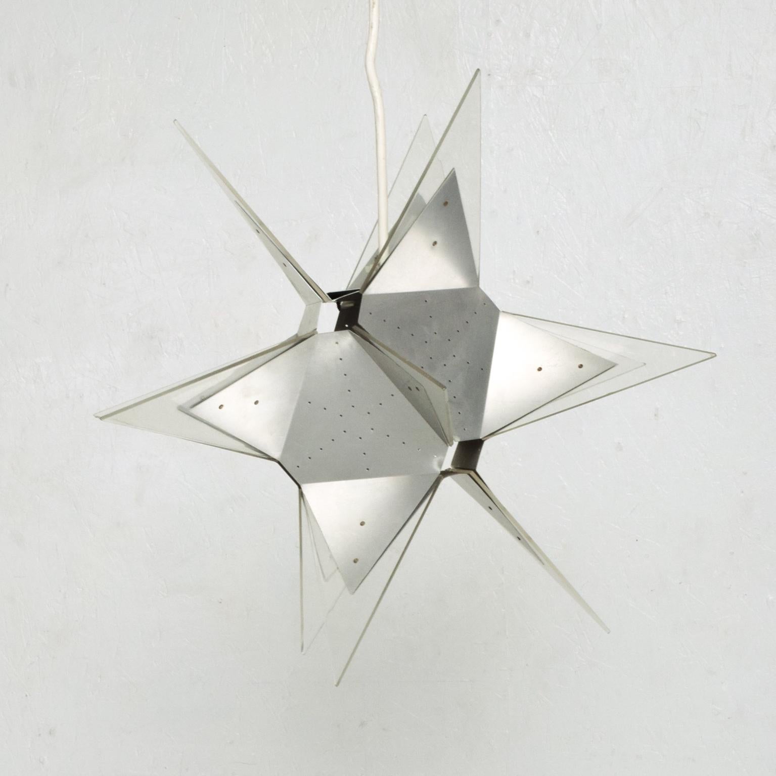 For your consideration a rare Mid-Century Modern Pop Art aluminum and plexiglass Moravian Star pendant lamp. Italy, circa the 1960s. Dimensions: H 16.5 in. x D 20 in.20
