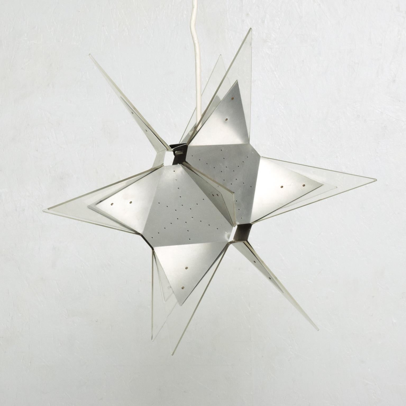 For your consideration a rare Mid-Century Modern Pop Art aluminium and plexiglass Moravian Star pendant lamp.
Italy, circa 1960s.
 