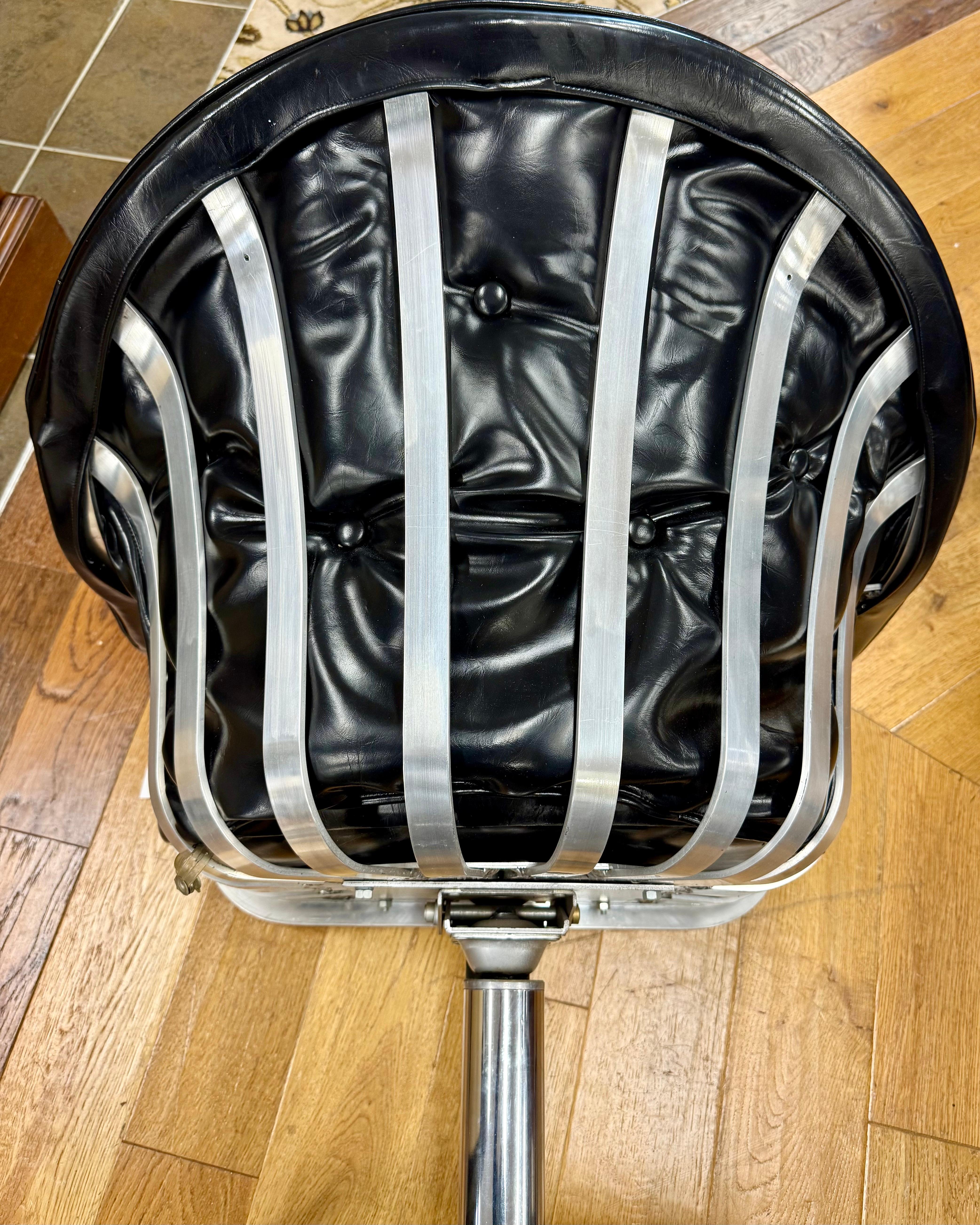 Mid-Century Modern Mid Century Modern Aluminum and Leather Swivel Chairs by Herbert Saiger Woodard For Sale