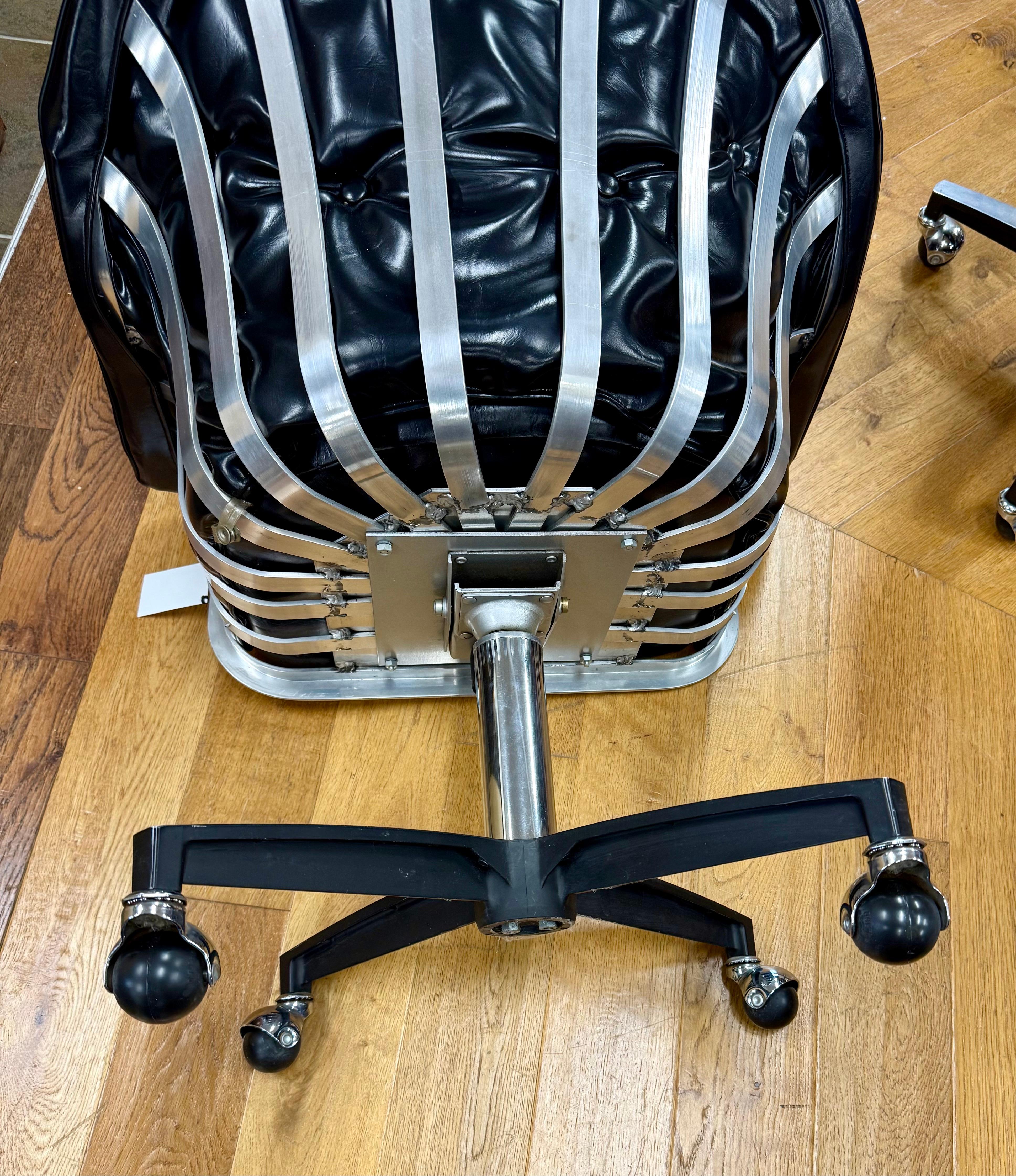 Mid Century Modern Aluminum and Leather Swivel Chairs by Herbert Saiger Woodard In Good Condition For Sale In West Hartford, CT