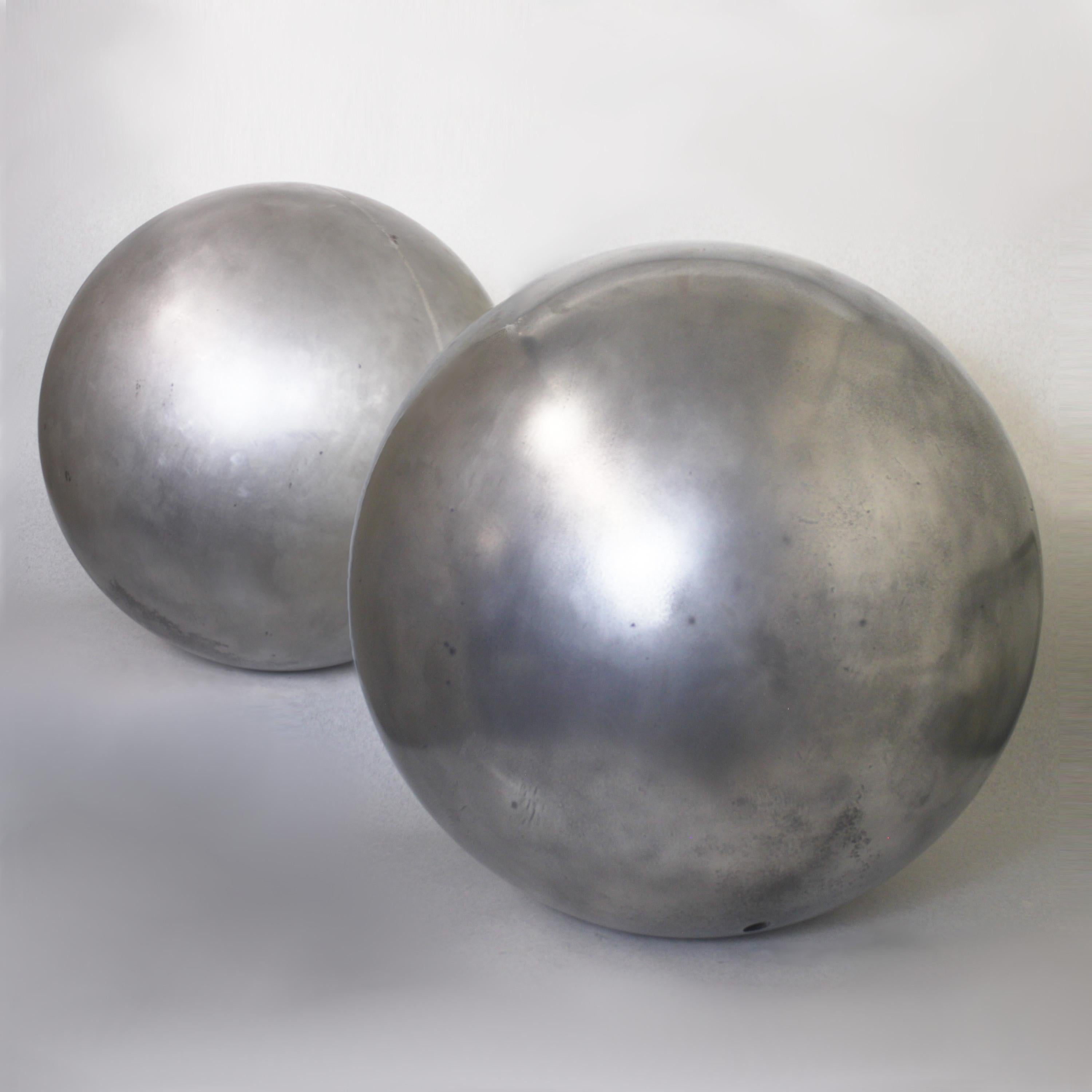Large vintage cast-aluminum architectural landscape Sphere. Sphere is constructed of two 7/16