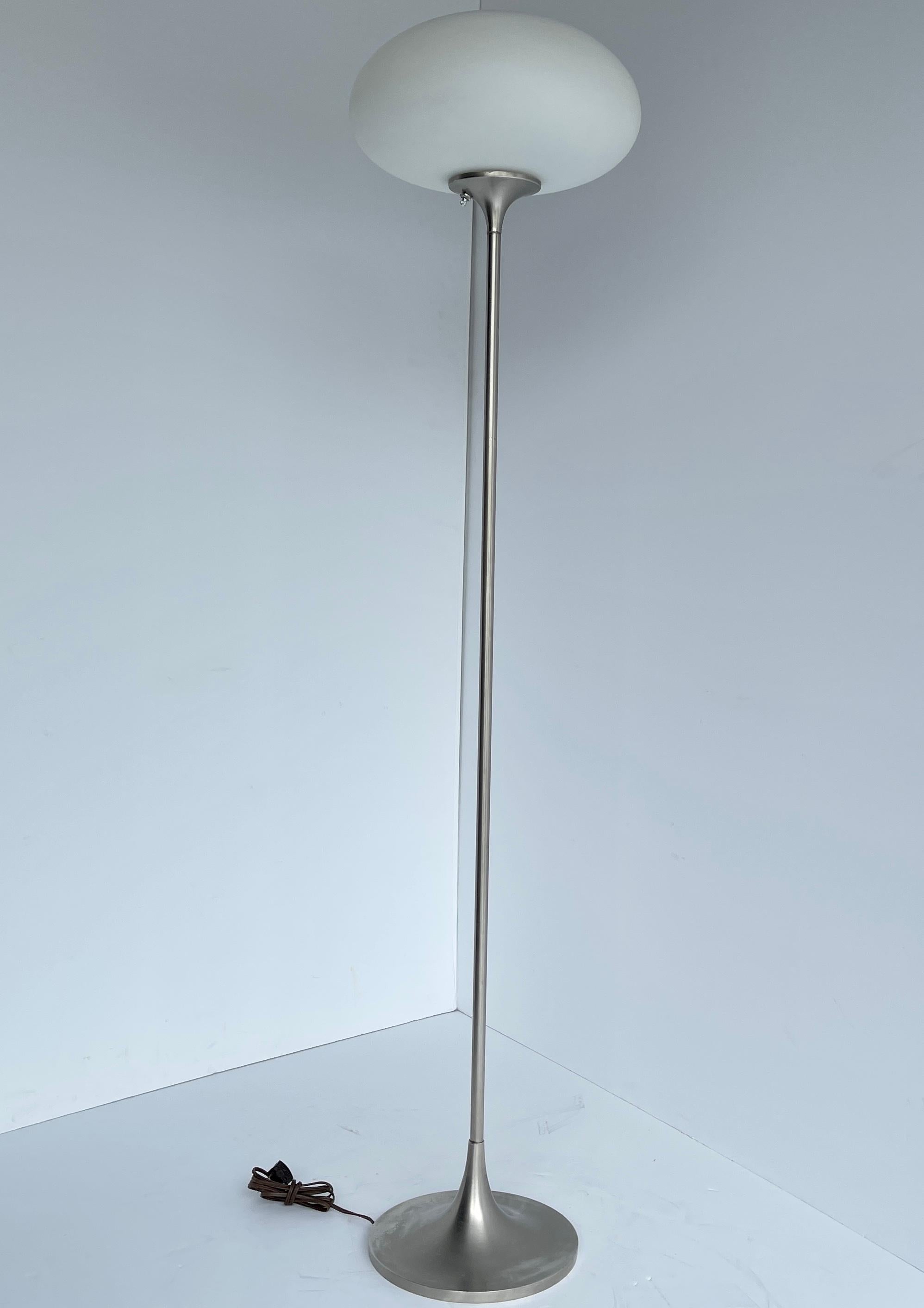 Mid-Century Modern mushroom floor lamp, marked 1973.
Classic and iconic mushroom floor lamp made by The Laurel Lamp Company of Newark, NJ. The brushed aluminum base and original frosted hand blown glass shade are a perfect example of the high