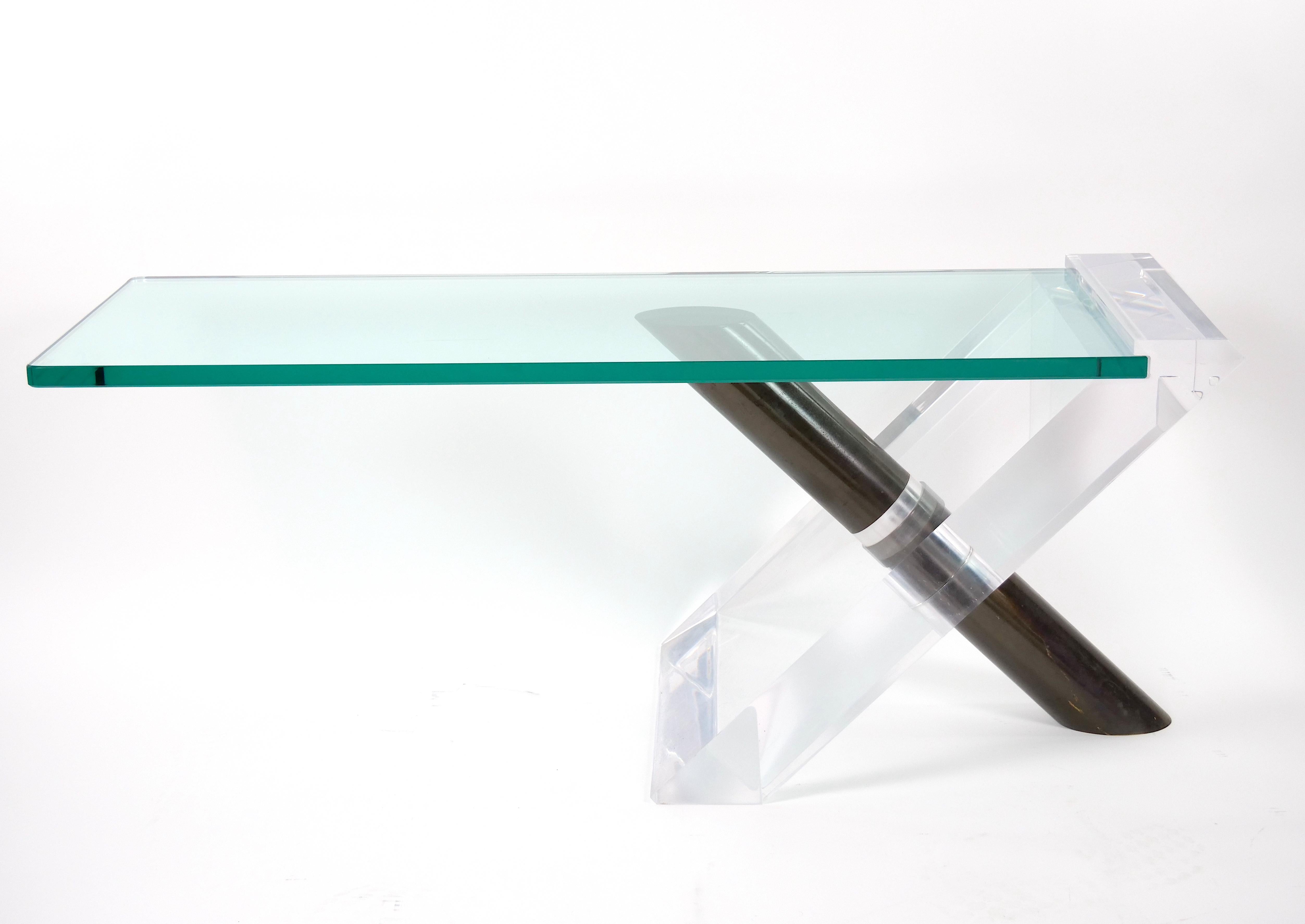 
Discover the perfect blend of Mid-Century Modern and Art Deco style aesthetics with this stunning lucite and heavy beveled glass top lipstick coffee table. Designed with convenience in mind, this table features a clever three-part breakdown for
