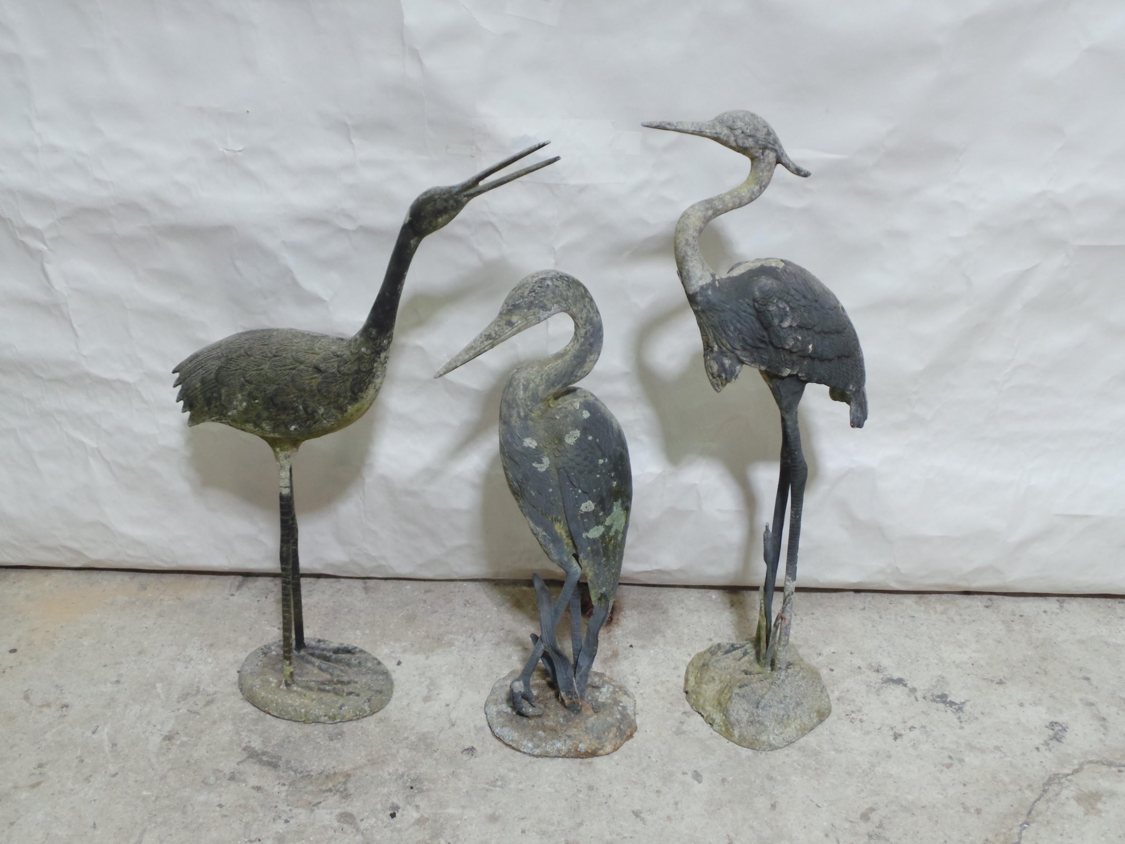 This is a really cool set of 3 Crane Birds.  there made out of Aluminum with concrete bases in there Original finish.
#1 is 34 high 22 wide 8 deep
#2 is 27 high 12 wide 8 deep
#3 is 35 high 15 wide 9 deep