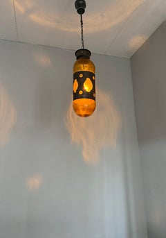 Mid-Century Modern Amber Glass and Patinated Metal Pendant, Attr. to Nanny Still