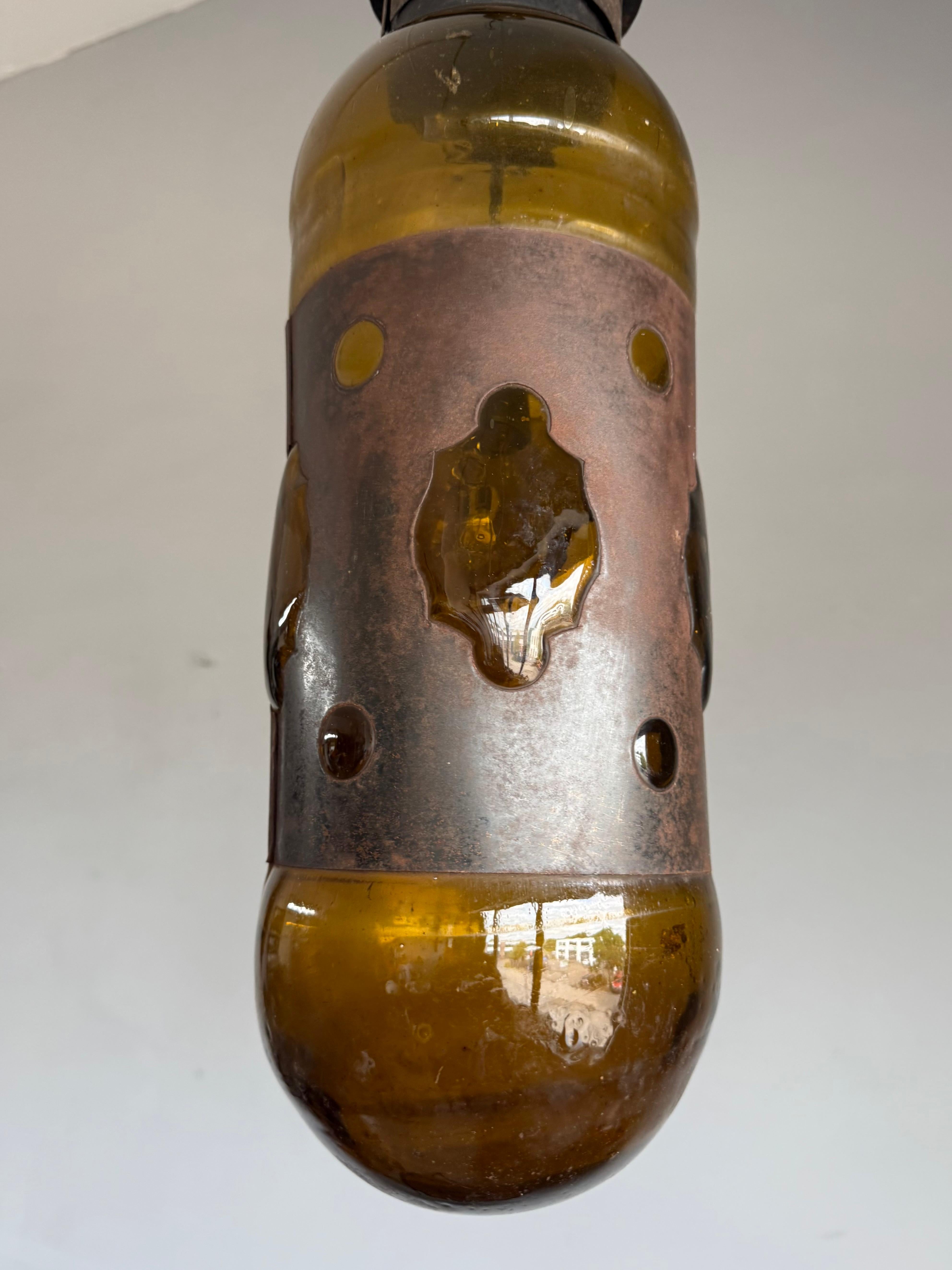 Mid-Century Modern Amber Glass and Patinated Metal Pendant, Attr. to Nanny Still In Good Condition For Sale In Lisse, NL