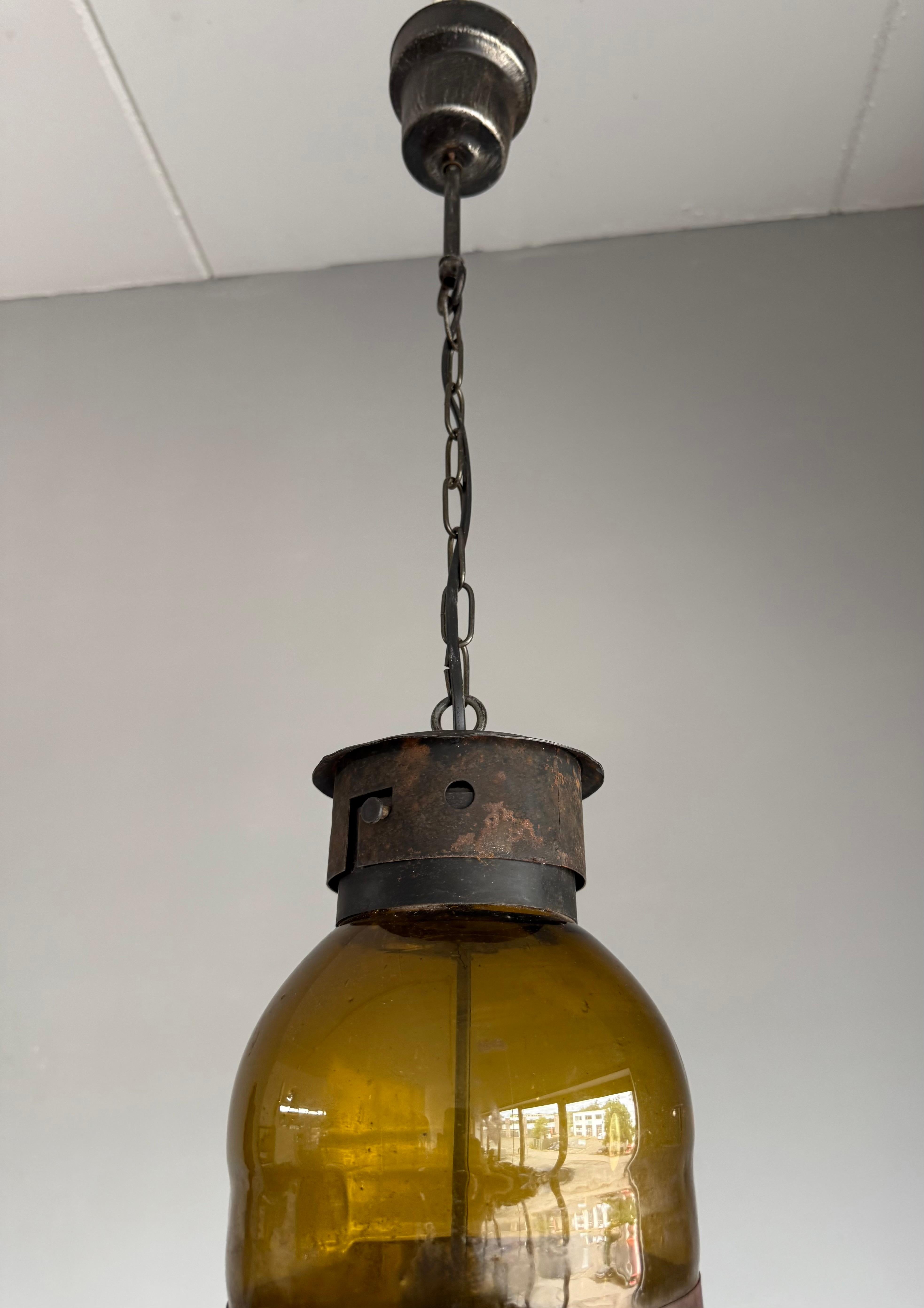20th Century Mid-Century Modern Amber Glass and Patinated Metal Pendant, Attr. to Nanny Still For Sale