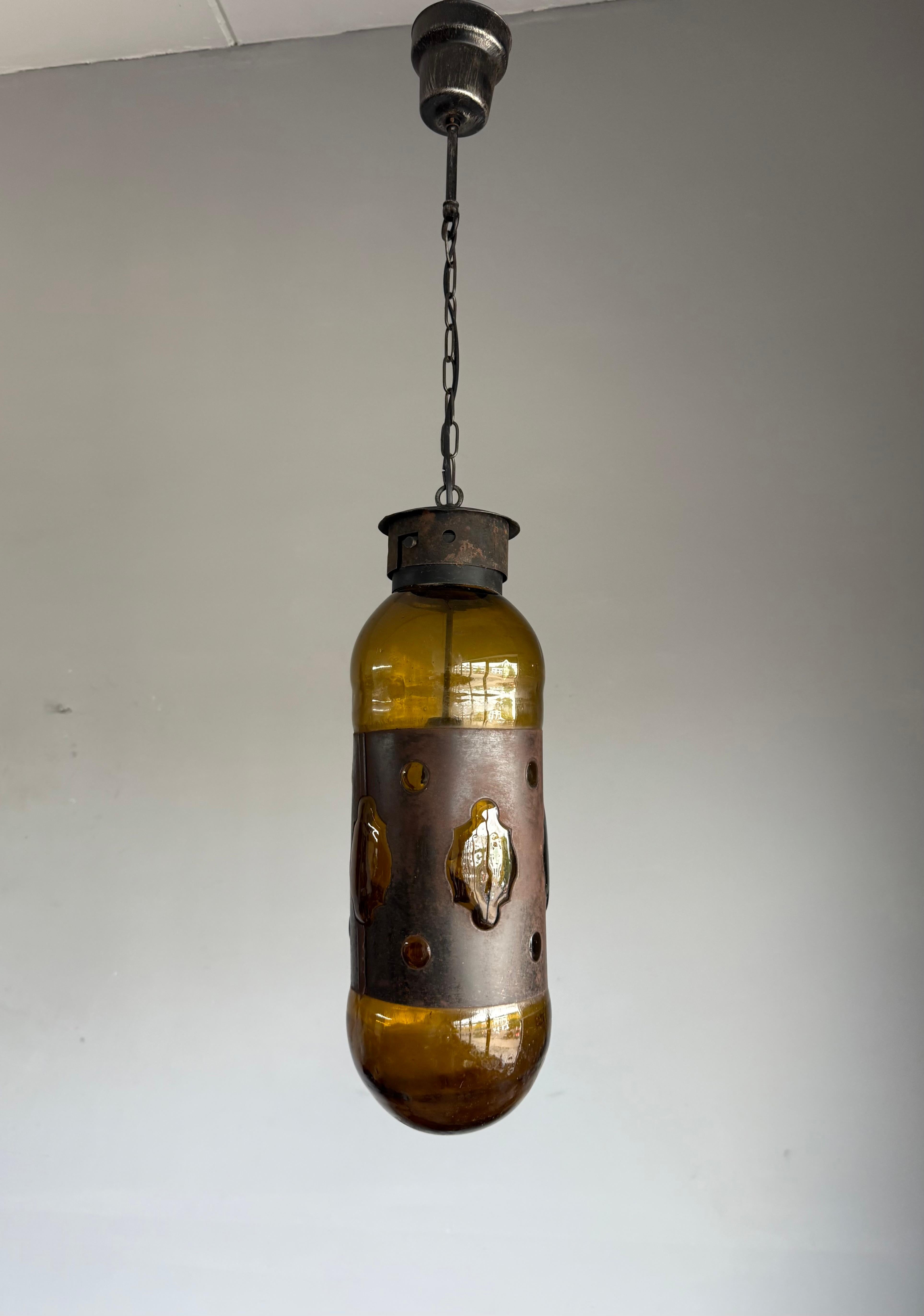 Mid-Century Modern Amber Glass and Patinated Metal Pendant, Attr. to Nanny Still For Sale 1