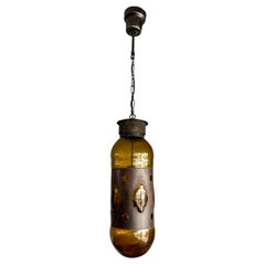 Mid-Century Modern Amber Glass and Patinated Metal Pendant, Attr. to Nanny Still