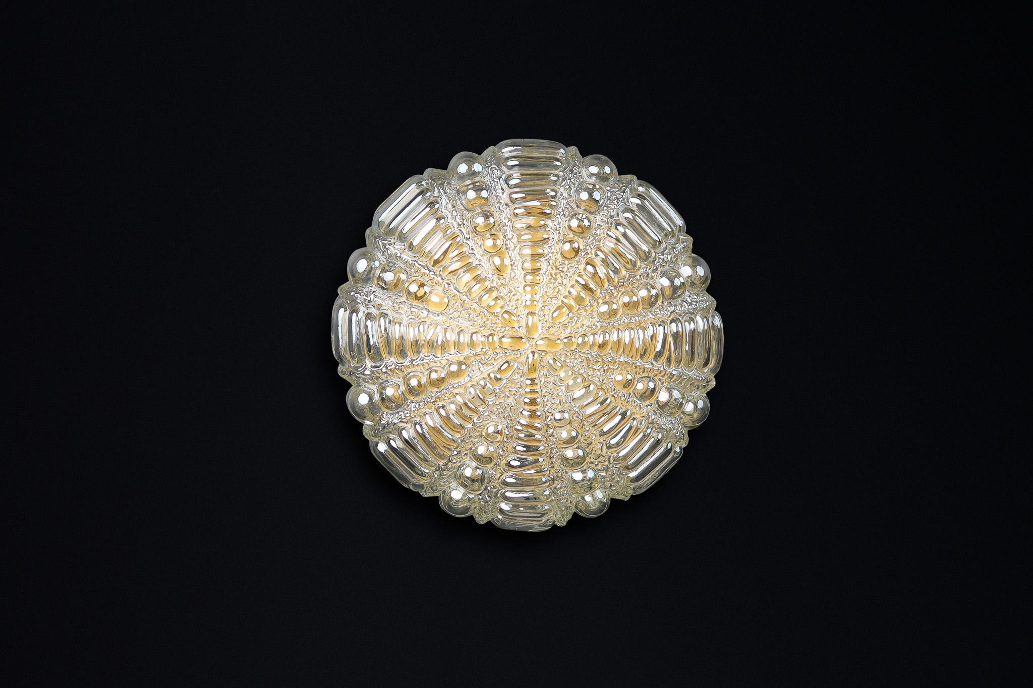 Mid-Century Modern amber glass ceiling or wall lights by Kaiser Leuchten Germany, 1950s

These stunning Mid-Century Modern Ceiling or Wall Lights by Kaiser Leuchten, Germany, feature beautiful amber and gold textured glass. The intricate patterns