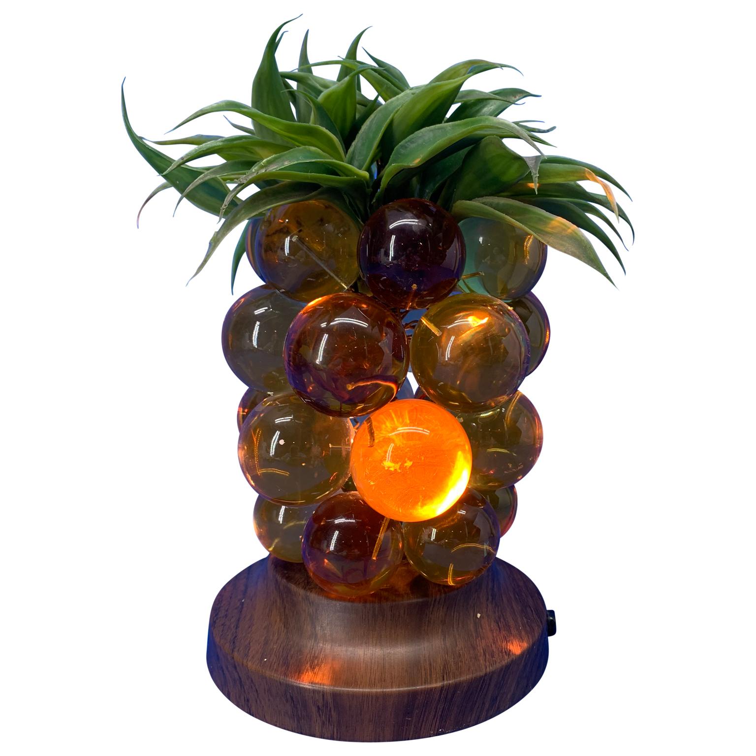 Mid-Century Modern yellow amber Lucite grapes palm tree table lamp.