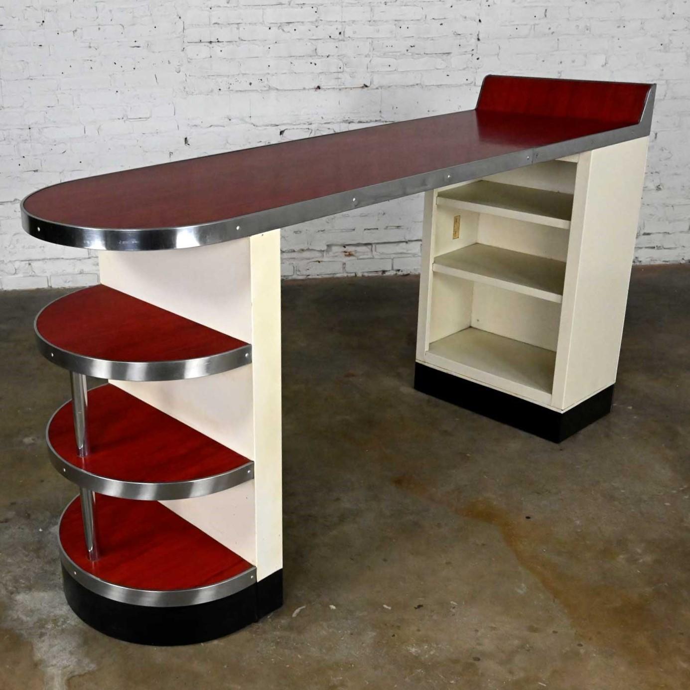 Wonderful vintage Mid-Century Modern American Kitchens brunch bar metal kitchen peninsula by AVCO Corporation. Comprised of a white metal base, red vinyl plastic bonded to steel countertops, and chrome trim. Beautiful condition, keeping in mind that