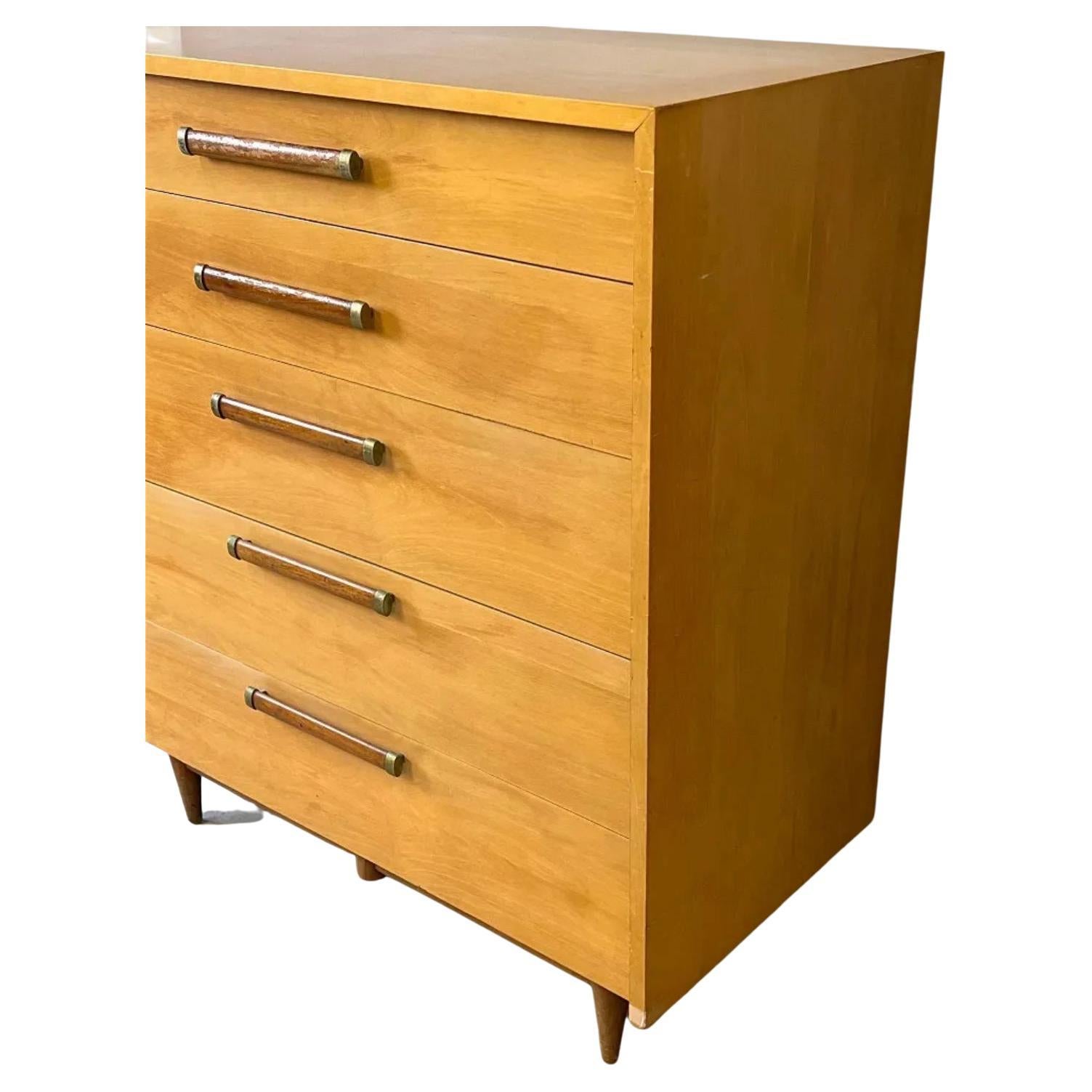 Mid-Century Modern American of Martinsville 5 drawer high tall dresser. A Merton Gershun for American of Martinsville Urban Suburban dresser. All Original Vintage condition - Blonde maple shows wear - Walnut and brass handles. All drawers slide