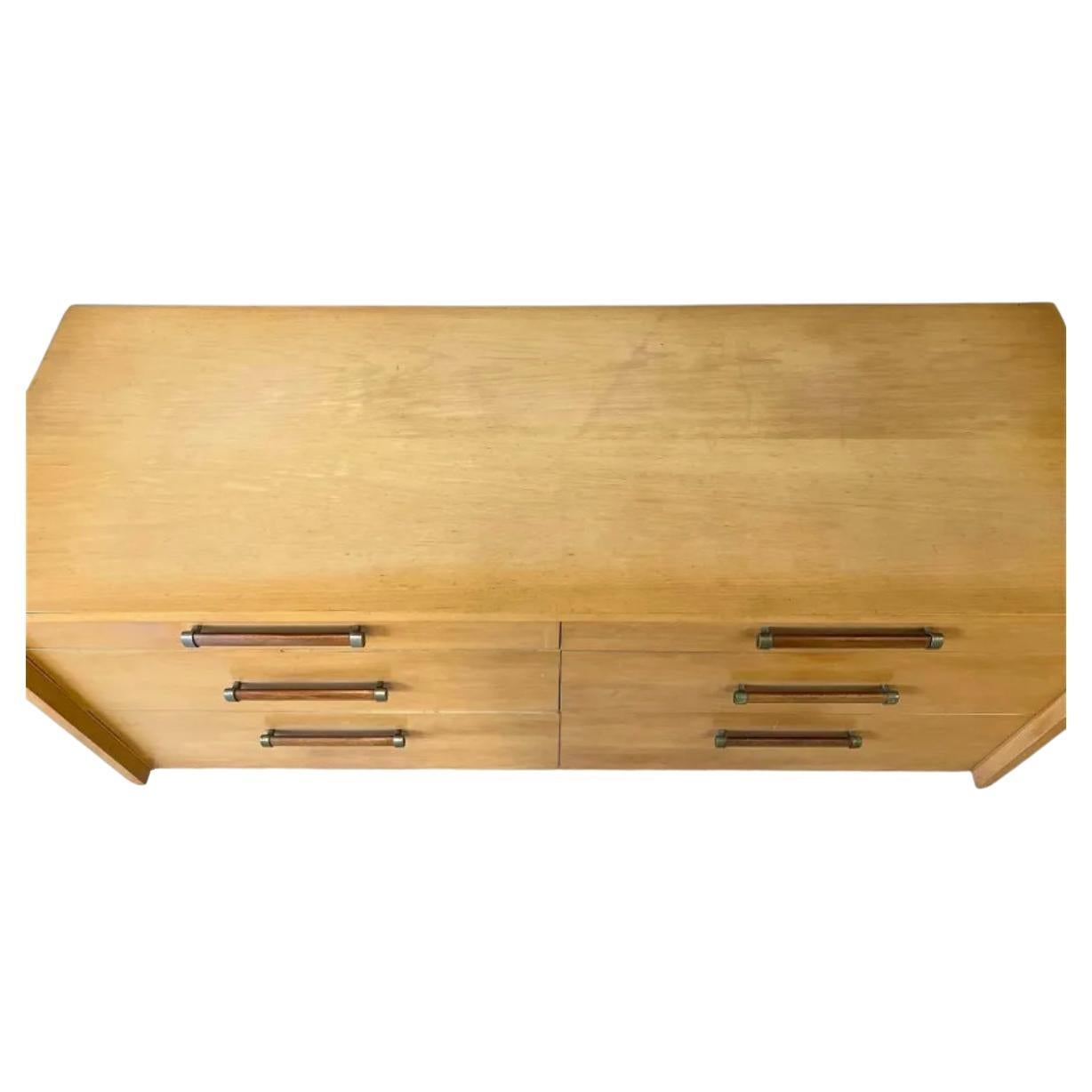 Mid-Century Modern American of Martinsville 6 drawer low dresser or credenza. A Merton Gershun for American of Martinsville Urban Suburban dresser. All Original Vintage condition - Blonde maple shows wear - Walnut and brass handles. All drawers
