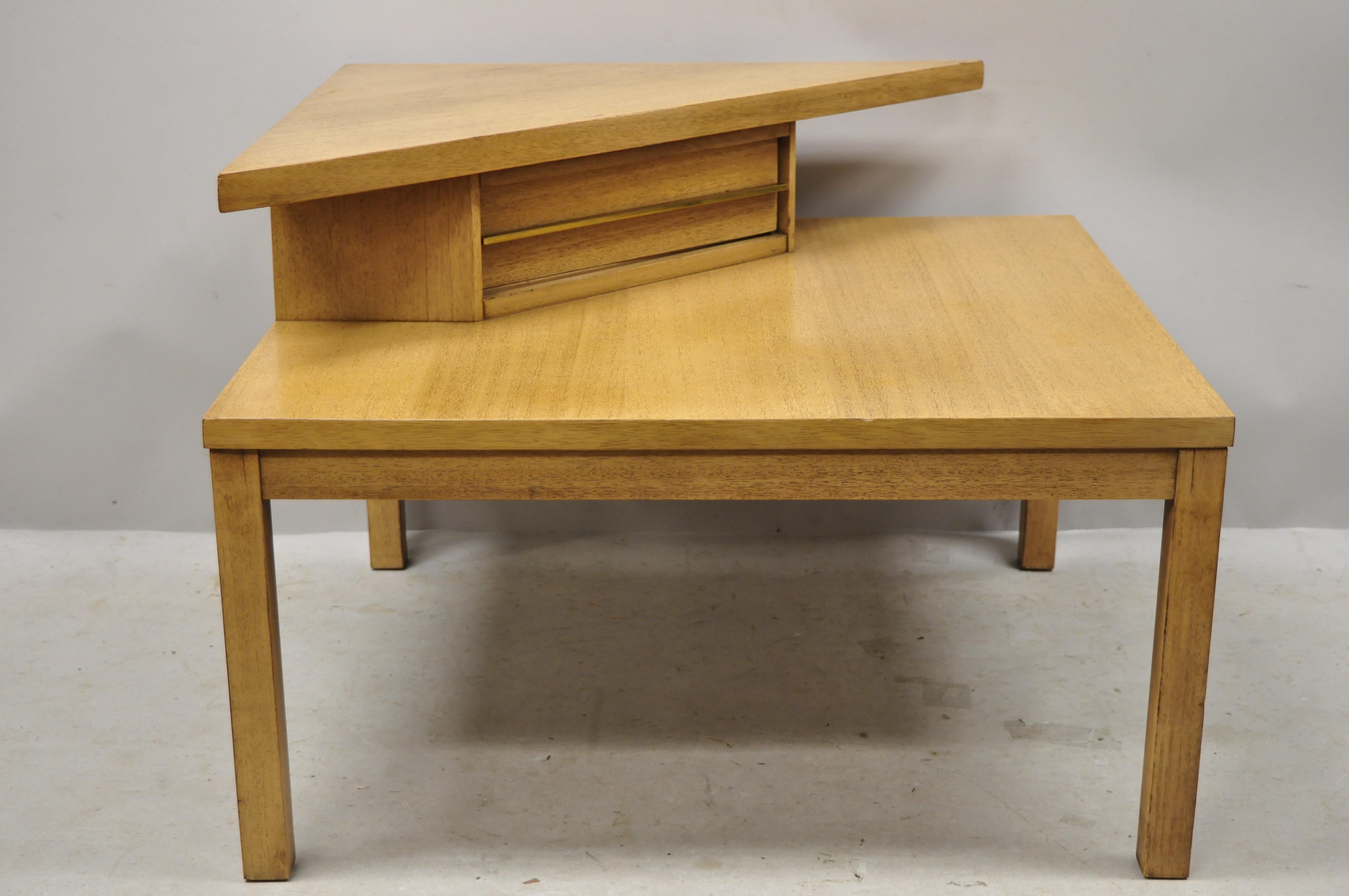 Mid-Century Modern American of Martinsville mahogany corner coffee side table with Brass Handle. Item features solid brass modernist sleek drawer handle, beautiful wood grain, original stamp, 1 dovetailed drawer, very nice vintage item, clean