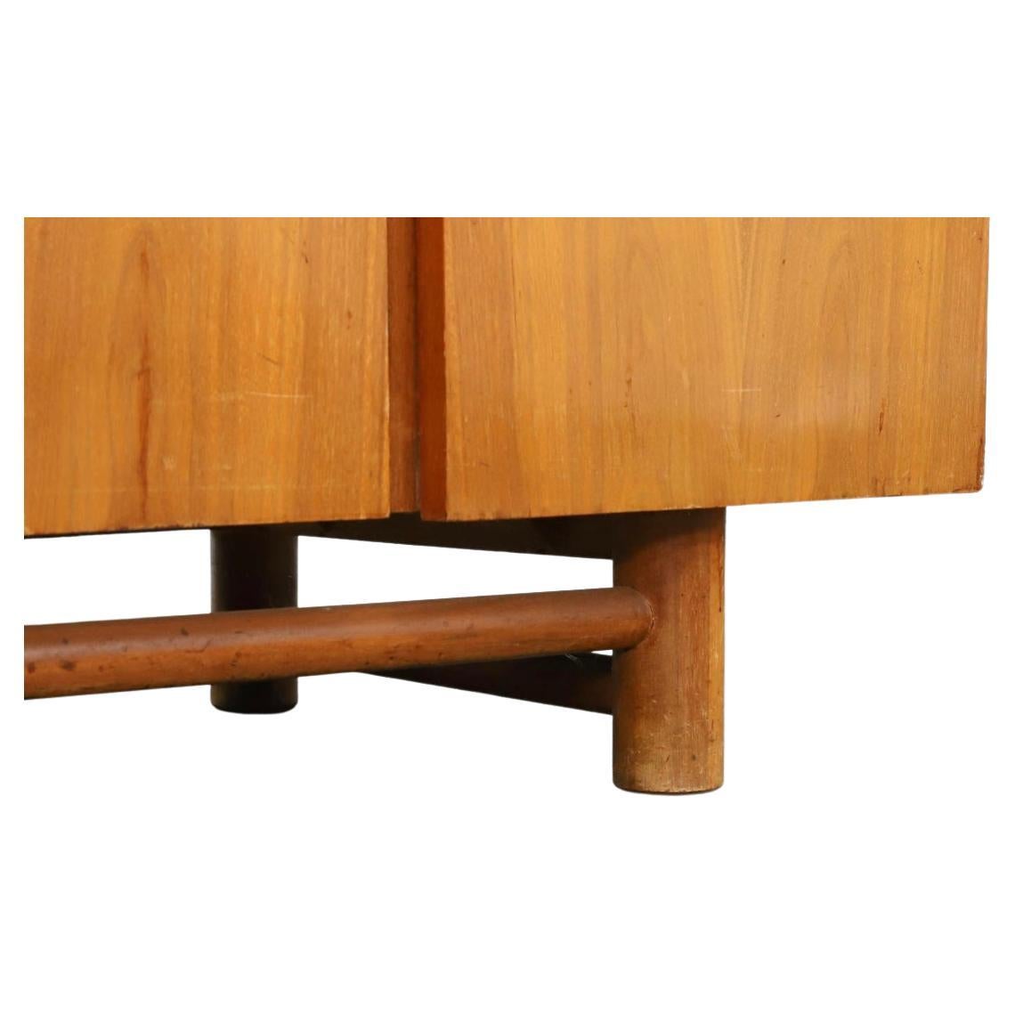 Mid-Century Modern American of Martinsville 4 drawer and 4 door credenza blonde wood. All Original Vintage condition - light maple wood shows little wear - Solid wood butterfly handles. All drawers slide smooth and clean inside. Has drawers and