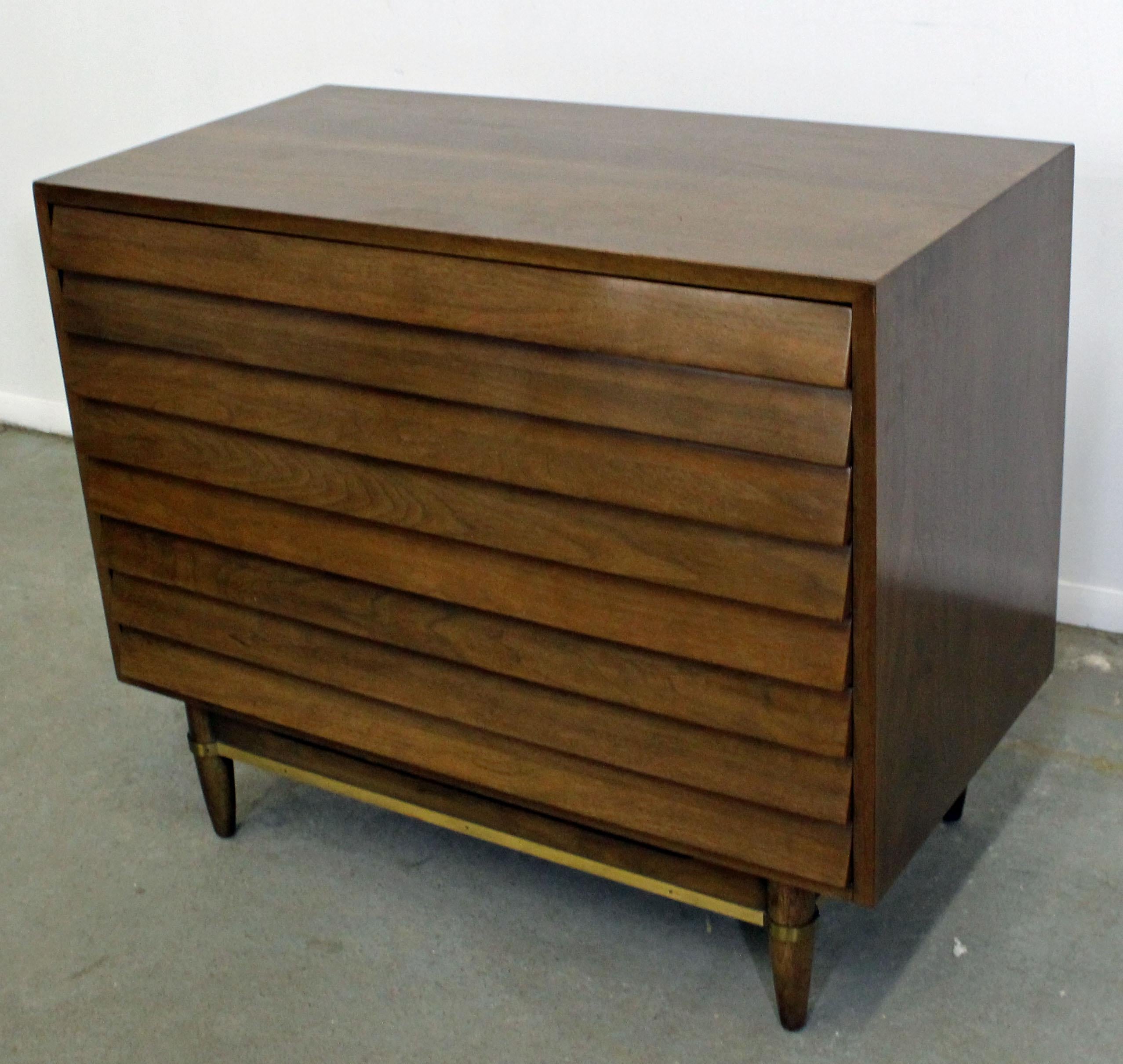 Offered is a bachelor chest, designed by Merton L. Gershun for American of Martinsville's 