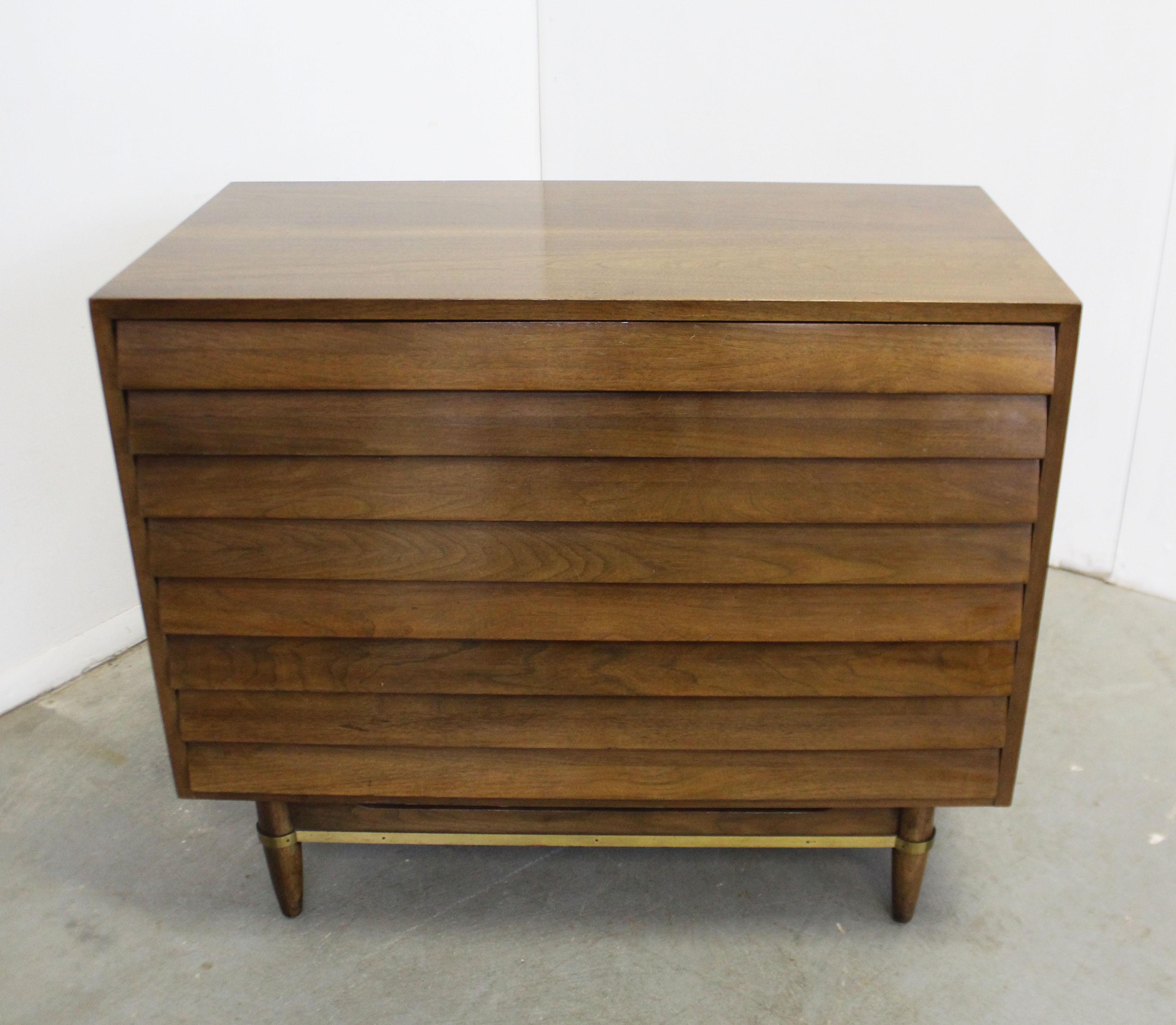 Offered is a bachelor chest, designed by Merton L. Gershun for American of Martinsville's 