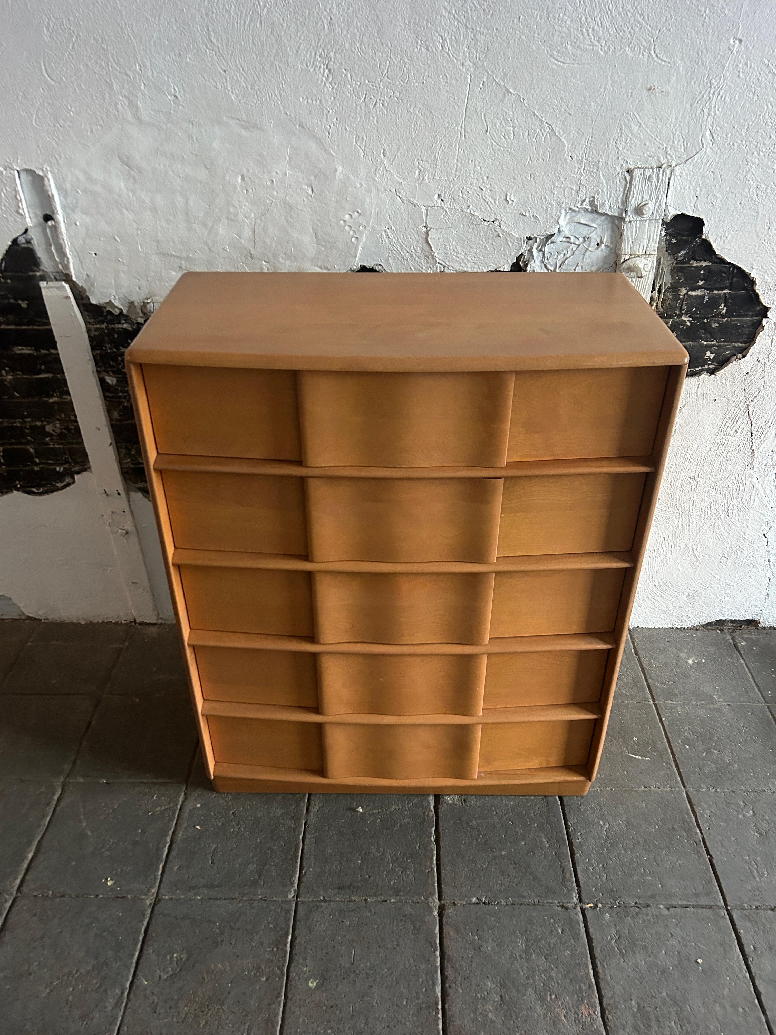 Timeless Heywood Wakefield Mid-Century Modern 5 drawer tall dresser. All solid maple construction with sculpted legs and drawer handles. Good vintage condition original blonde finish clean inside and out. Circa 1950 - Located in Brooklyn