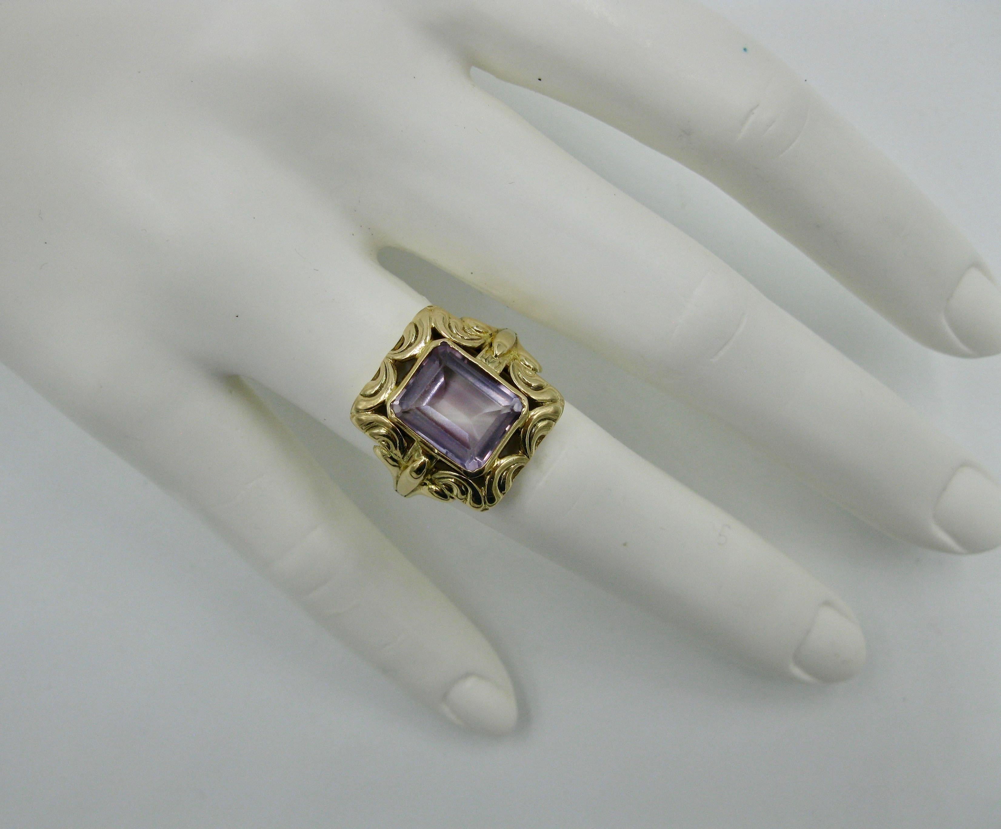 The stunning Amethyst 14 Karat Gold mid-century modern ring was made in Finland in 1957.  A piece created by the esteemed Finnish Jewelry designers from the Mid Century period in Scandinavia.  The beautiful Rose De France color Amethyst is emerald